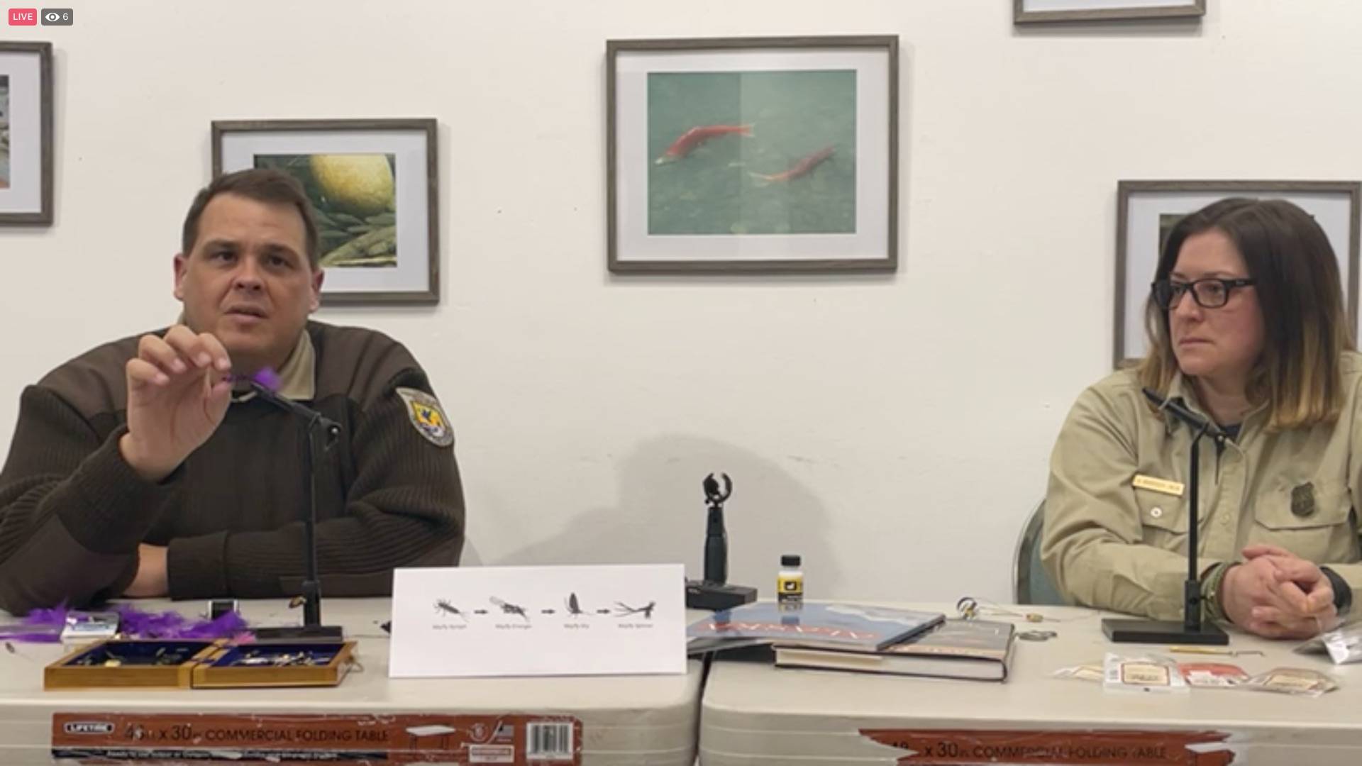 Matt Conner (left) and Amber Kraxberger-Linson demonstrate how to tie flies during a remote workshop on Friday, March 26, 2021, in Alaska. (Screenshot)