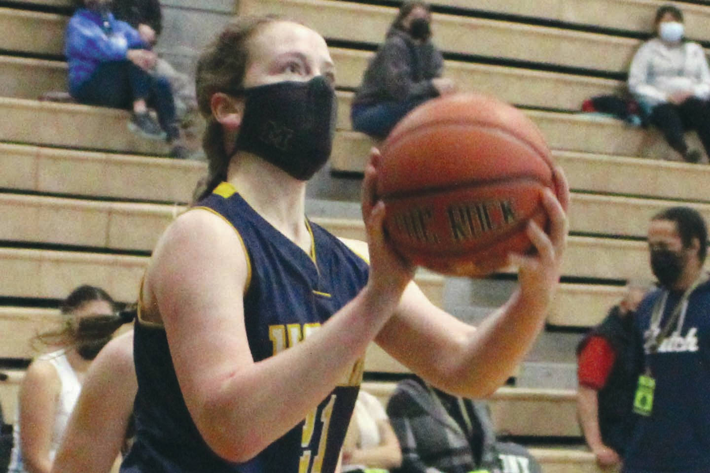 Homer's Sophie Ellison triggers a shot against Hutchison on Friday, March 26, 2021, at the Class 3A state basketball tournament at Colony High School in Alaska. (Photo by Tim Rockey/Frontiersman)