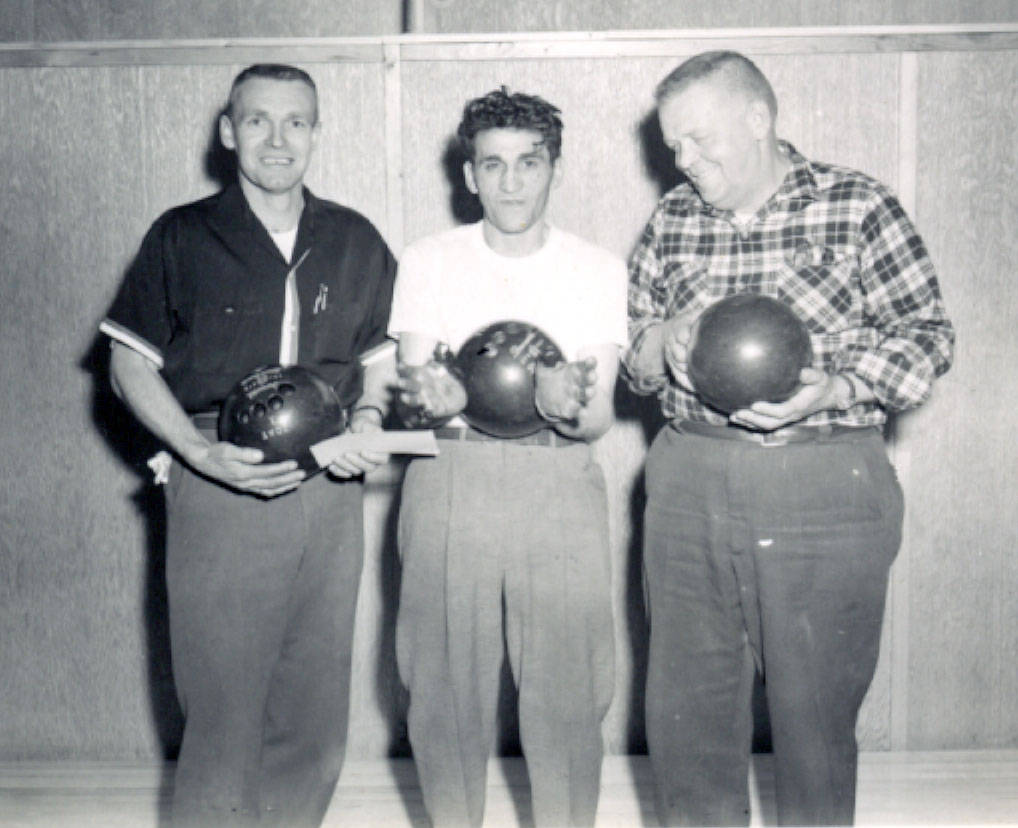 Shortly after setting a new world record in endurance bowling in June 1960, Kenai’s Tony Bordenelli (center) poses with Soldotna bowling alley owner Burton Carver (left) and “trainer” Charlie Hill. (Cheechako News photographs courtesy of the KPC Anthropology Lab Archive)