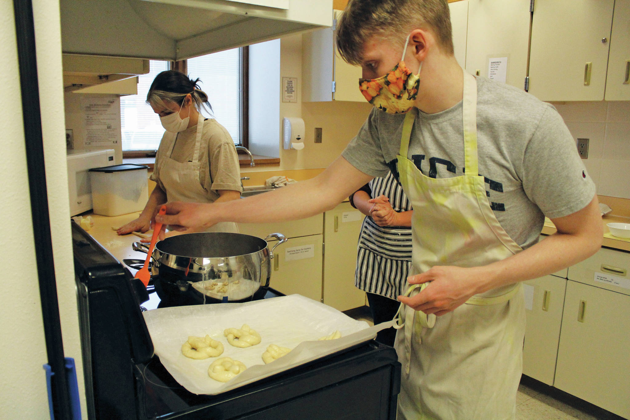 Photo by Katelyn Engebretsen / Homer High Yearbook
Zoe Adkins and Emmet Wilkinson prepare pretzels in a high school food and nutrition class at Homer High School.