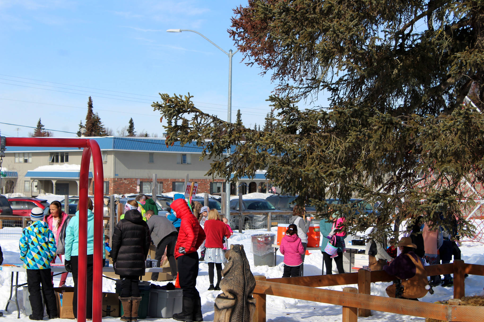 Families participate in activities at an Easter celebration at Kenai Municipal Park on Friday, April 2, 2021 in Kenai, Alaska. (Ashlyn O’Hara/Peninsula Clarion)