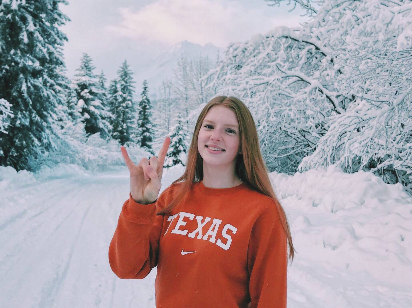 Lydia Jacoby celebrates her commitment to the University of Texas in Seward recently. (Photo by Leslie Jacoby)