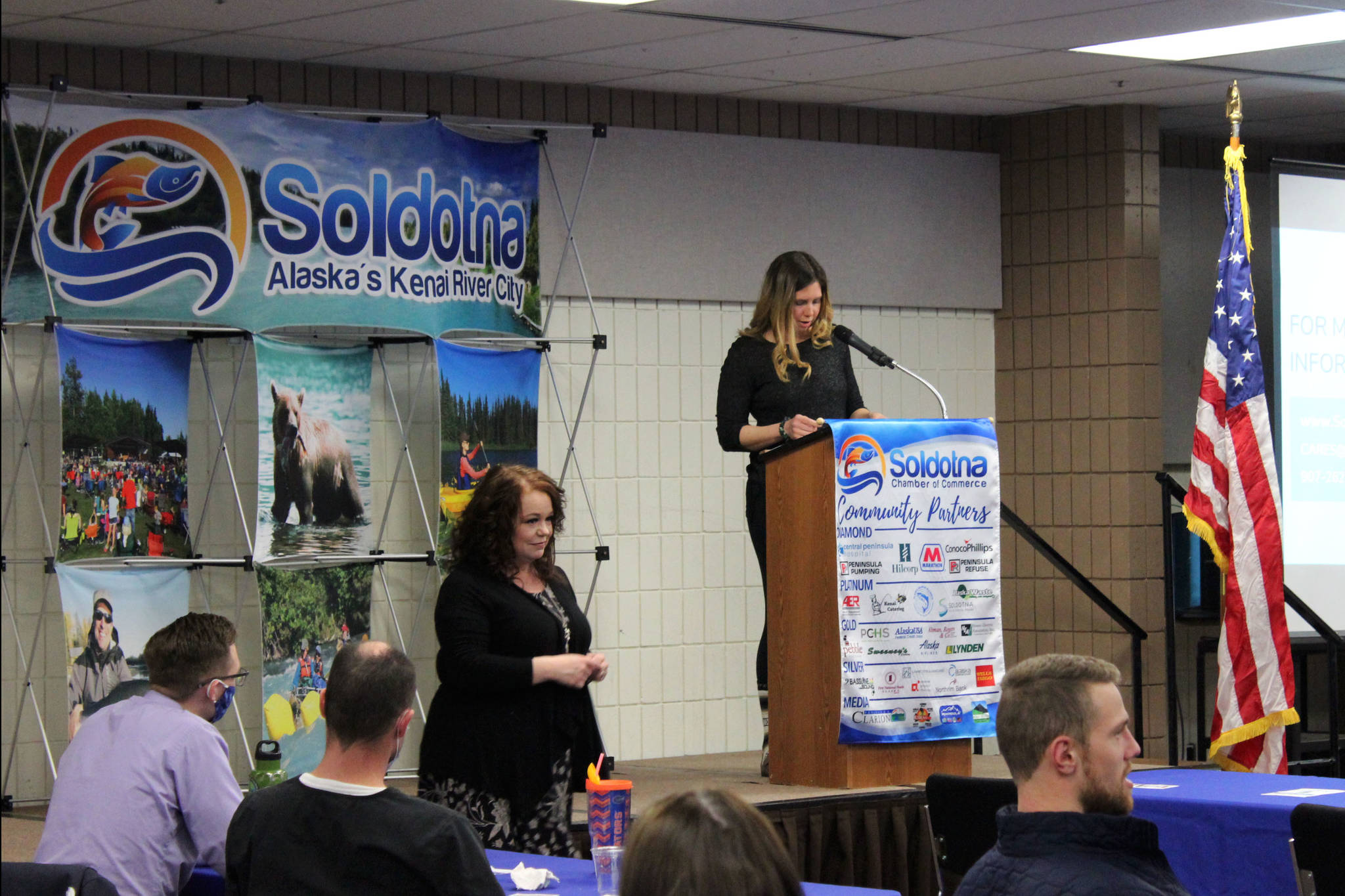 Pamela Parker (center) and Shanon Davis present at a Soldotna Chamber of Commerce luncheon on Wednesday, April 14, 2021 in Soldotna, Alaska. (Ashlyn O’Hara/Peninsula Clarion)