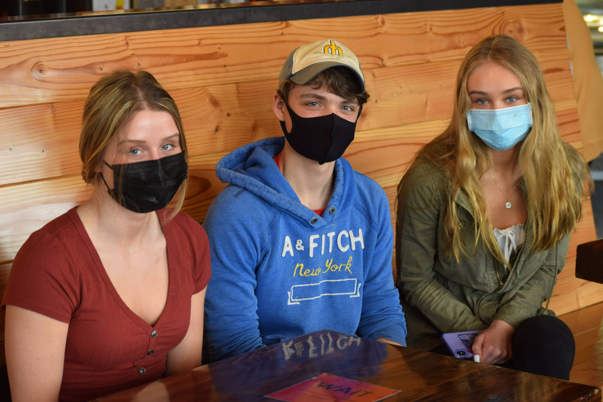 From left to right: Rhys Cannava, 16, Quinn Cox, 17, and Jolie Widaman, 16, are pictured here in Soldtna, Alaska on Thursday, April 15, 2021. The three Soldotna High School juniors got vaccinated against COVID-19 in March 2021.