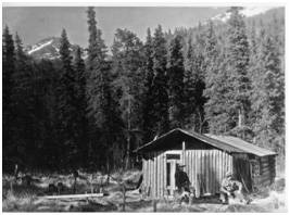 Photo from the Culverson Collection, Anchorage Museum of History and Art 
The Jean Lake shelter cabin in this undated photo belonged originally to a homesteader who gave permission to the Alaska Road Commission to upgrade the structure and use it as part of the overland winter mail route in the early 20th century.