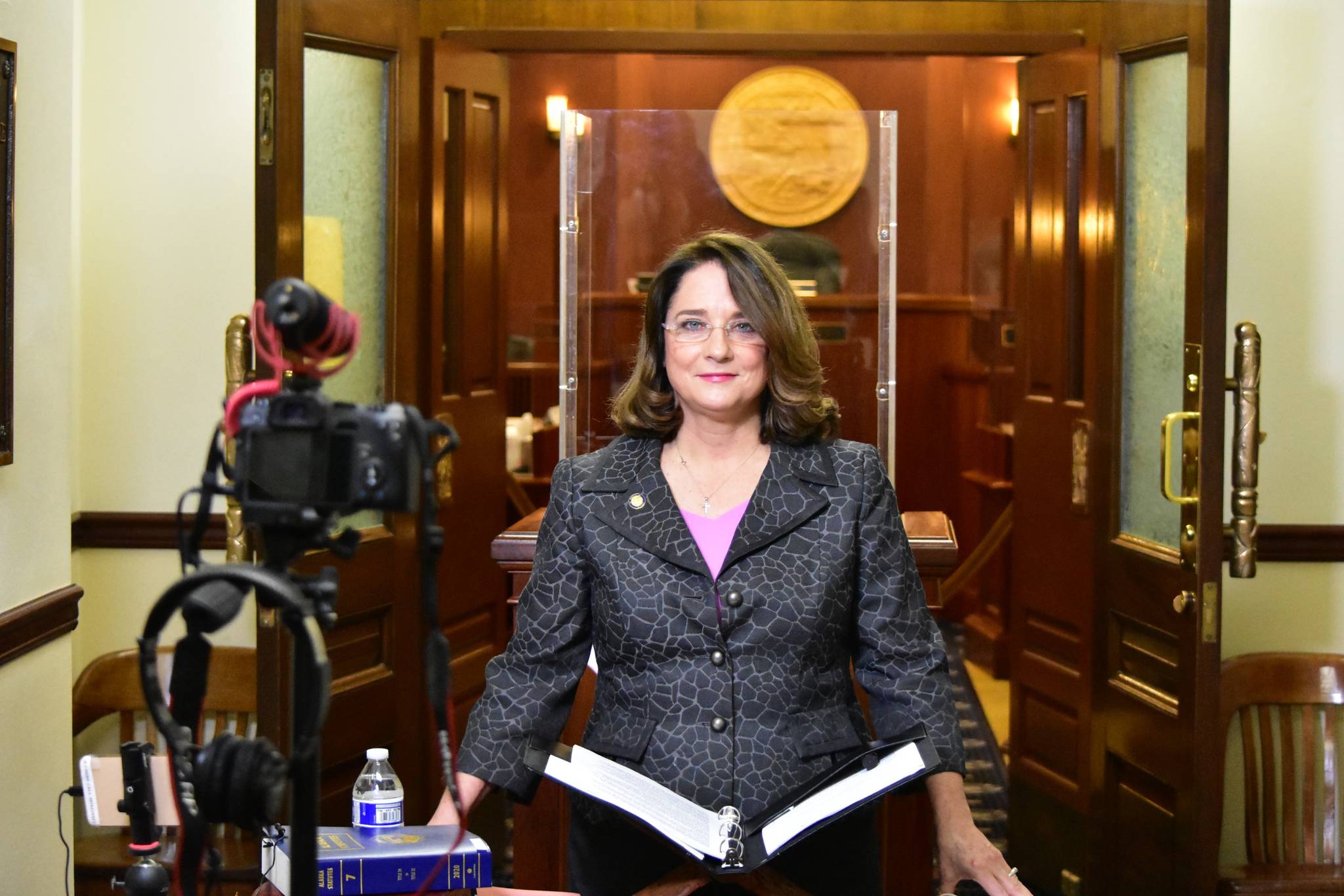 Sen. Lora Reinbold, R-Eagle River, holds a press in front of the doors to the Senate chambers on Thursday, March 4, 2021. Reinbold called the conference to respond to a letter from Gov. Mike Dunleavy saying he would no longer participate with her as chair of the Senate Judicairy Committee. (Peter Segall / Juneau Empire)