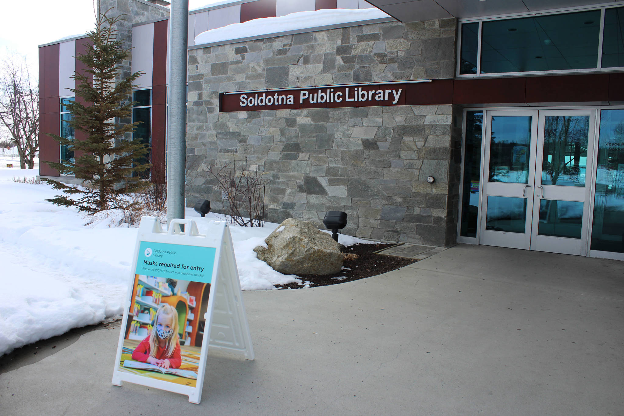 The entrance to Soldotna Public Library is seen on Thursday, March 25, 2021 in Soldotna, Alaska. (Ashlyn O’Hara/Peninsula Clarion)