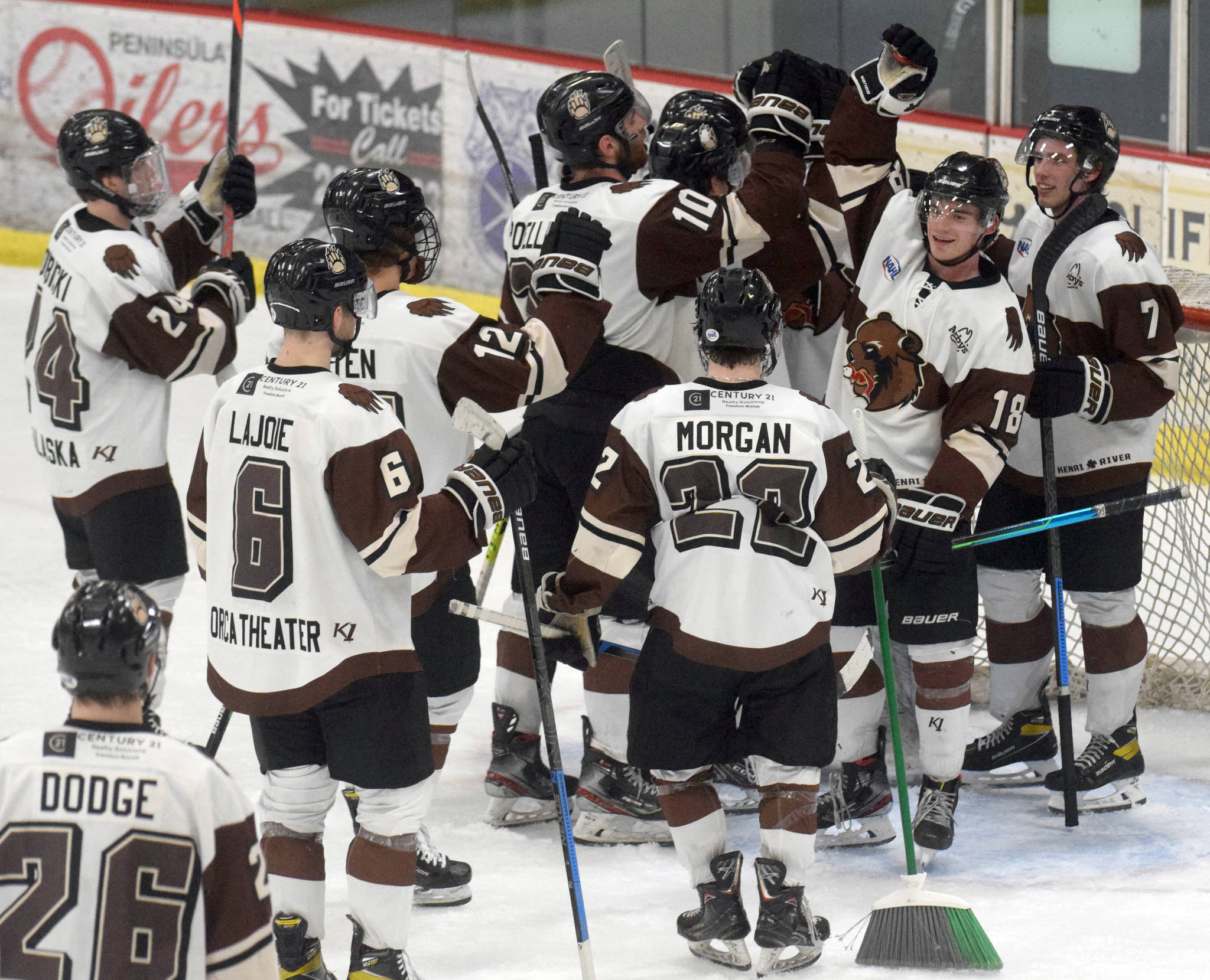 The Kenai River Brown Bears celebrate a three-game sweep of the Chippewa (Wisconsin) Steel on Sunday, April 25, 2021, at the Soldotna Regional Sports Complex in Soldotna, Alaska. (Photo by Jeff Helminiak/Peninsula Clarion)