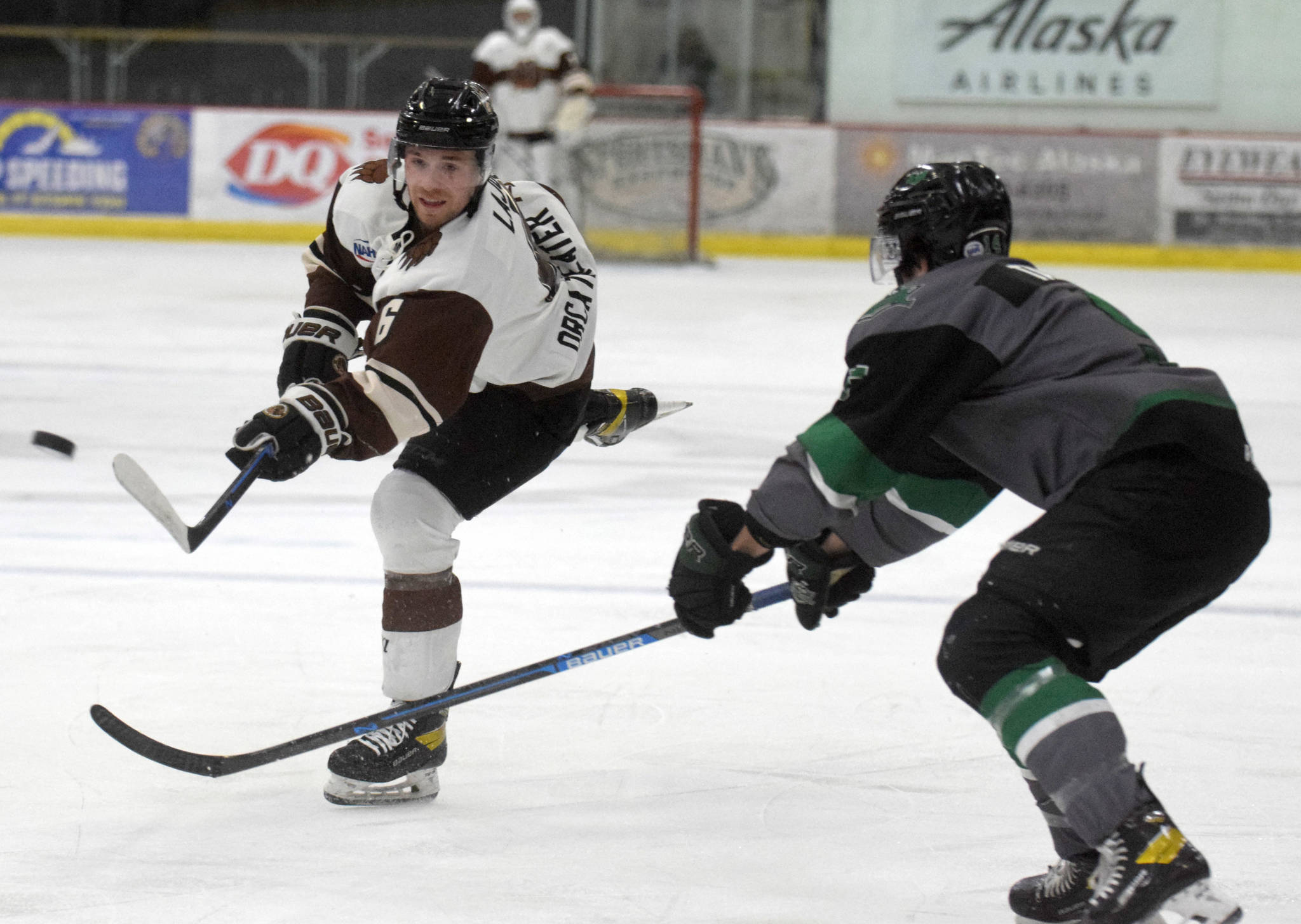 Kenai River Brown Bears forward Brandon Lajoie, of Eagle River, shoots against the Chippewa (Wisconsin) Steel on Sunday, April 25, 2021, at the Soldotna Regional Sports Complex in Soldotna, Alaska. (Photo by Jeff Helminiak/Peninsula Clarion)