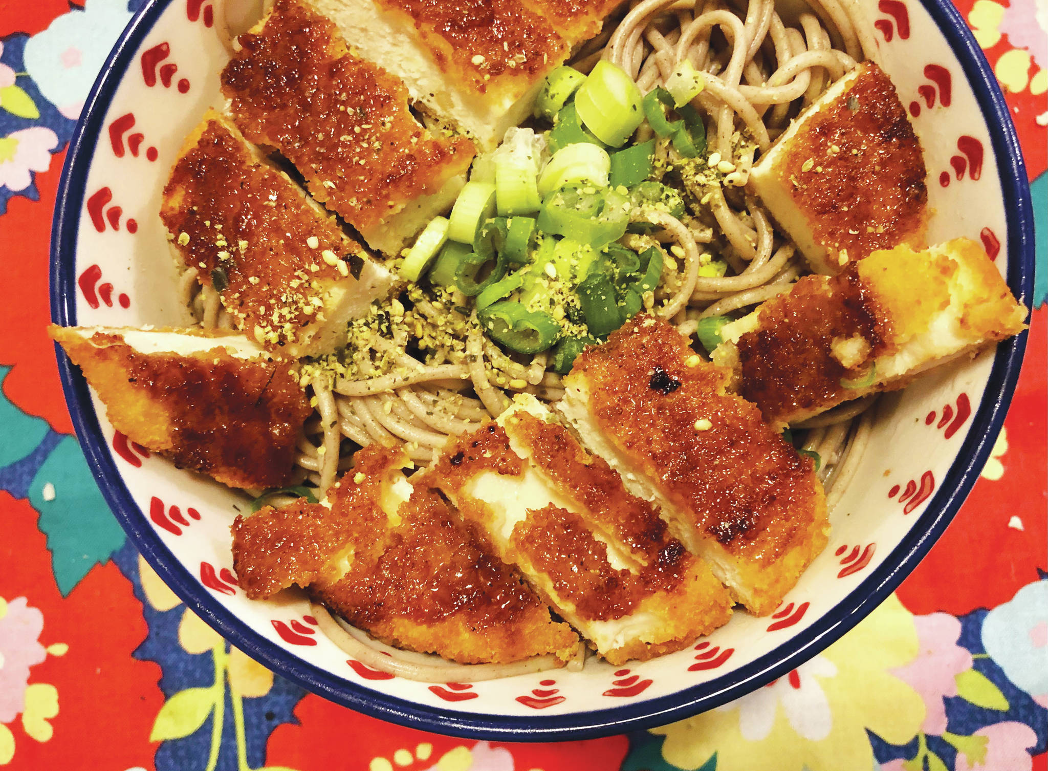 A chicken patty adds to a simple Japanese-cuisine-inspired noodle bowl, photographed on Jan. 15, 2021, in Anchorage, Alaska. (Photo by Victoria Petersen/Peninsula Clarion)