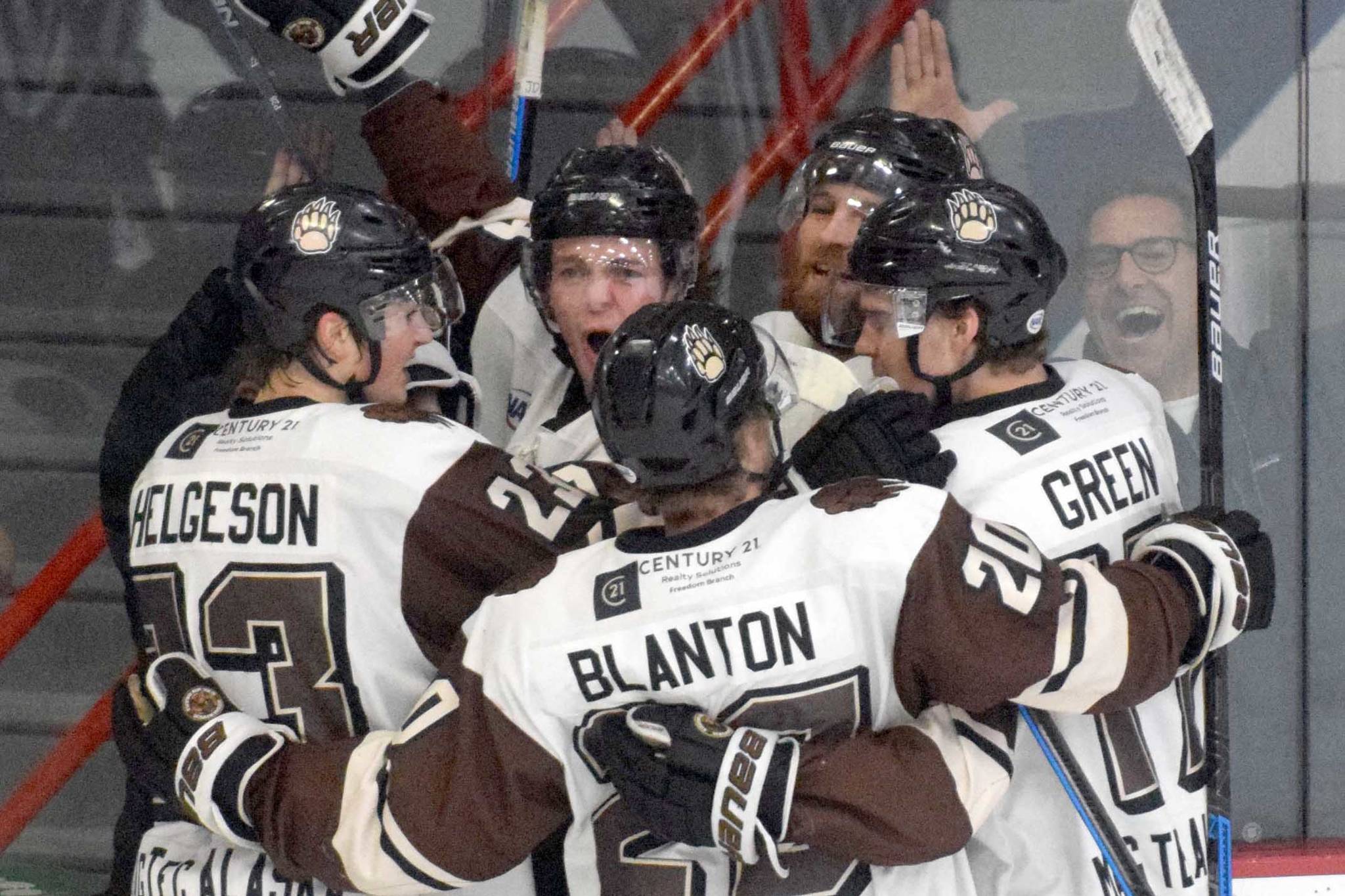 The Kenai River Brown Bears celebrate the first-period goal of Shayne Tomlinson (second from left) Friday, April 30, 2021 at the Soldotna Regional Sports Complex in Soldotna, Alaska. (Photo by Jeff Helminiak/Peninsula Clarion)