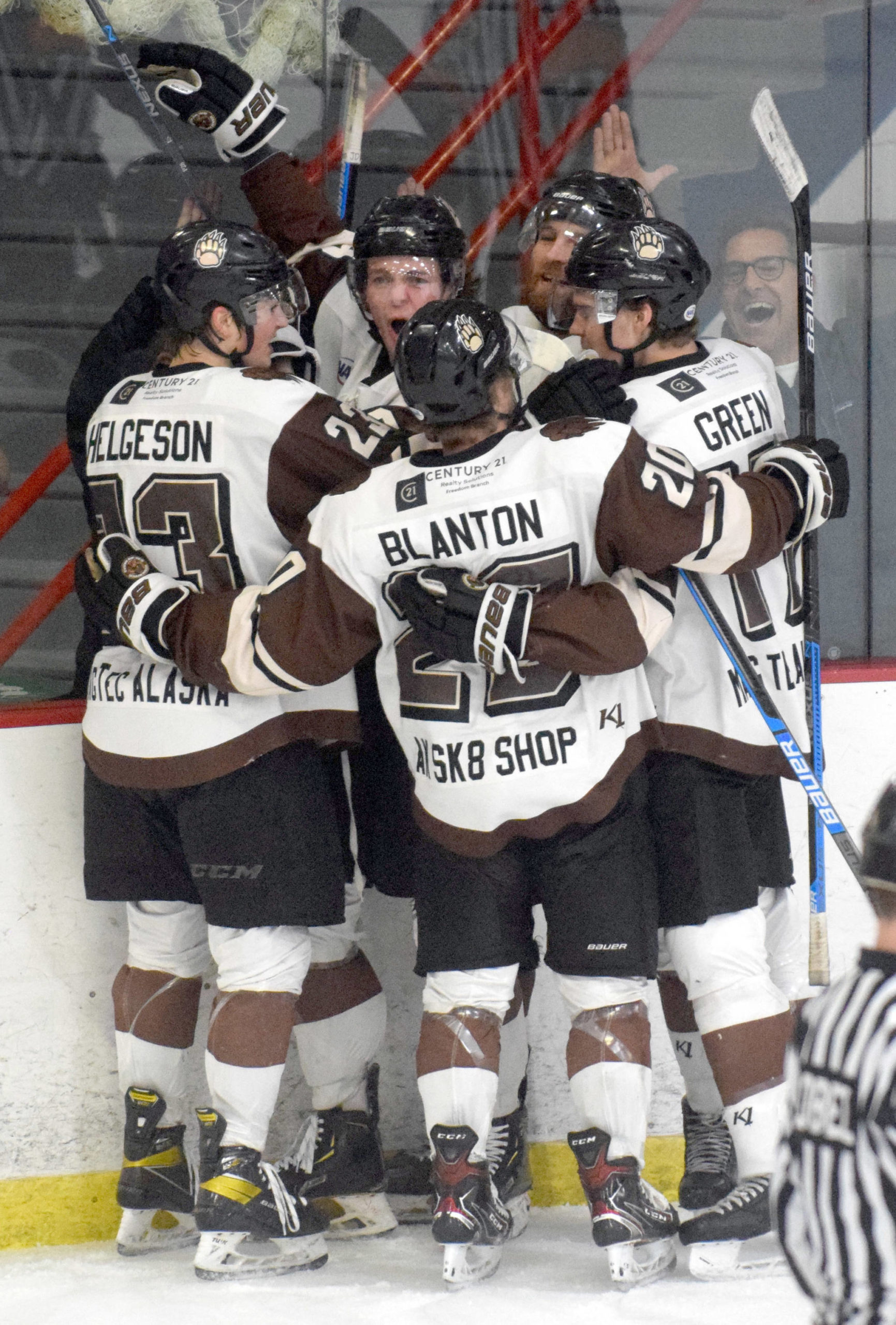 The Kenai River Brown Bears celebrate the first-period goal of Shayne Tomlinson (second from left) Friday, April 30, 2021 at the Soldotna Regional Sports Complex in Soldotna, Alaska. (Photo by Jeff Helminiak/Peninsula Clarion)