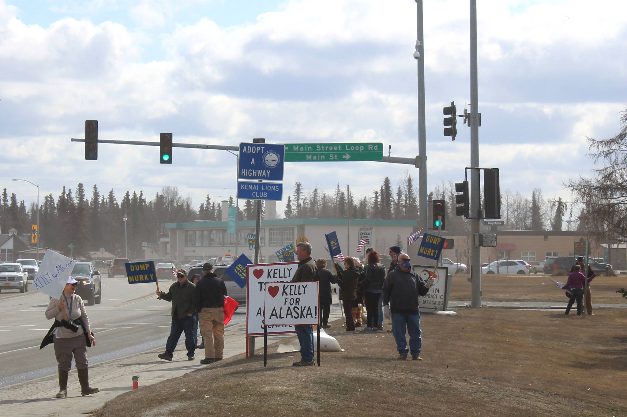 People protest outside of the Kenai Chamber of Commerce and Visitor Center on Wednesday, May 5, 2021 in Kenai, Alaska. (Ashlyn O’Hara/Peninsula Clarion)