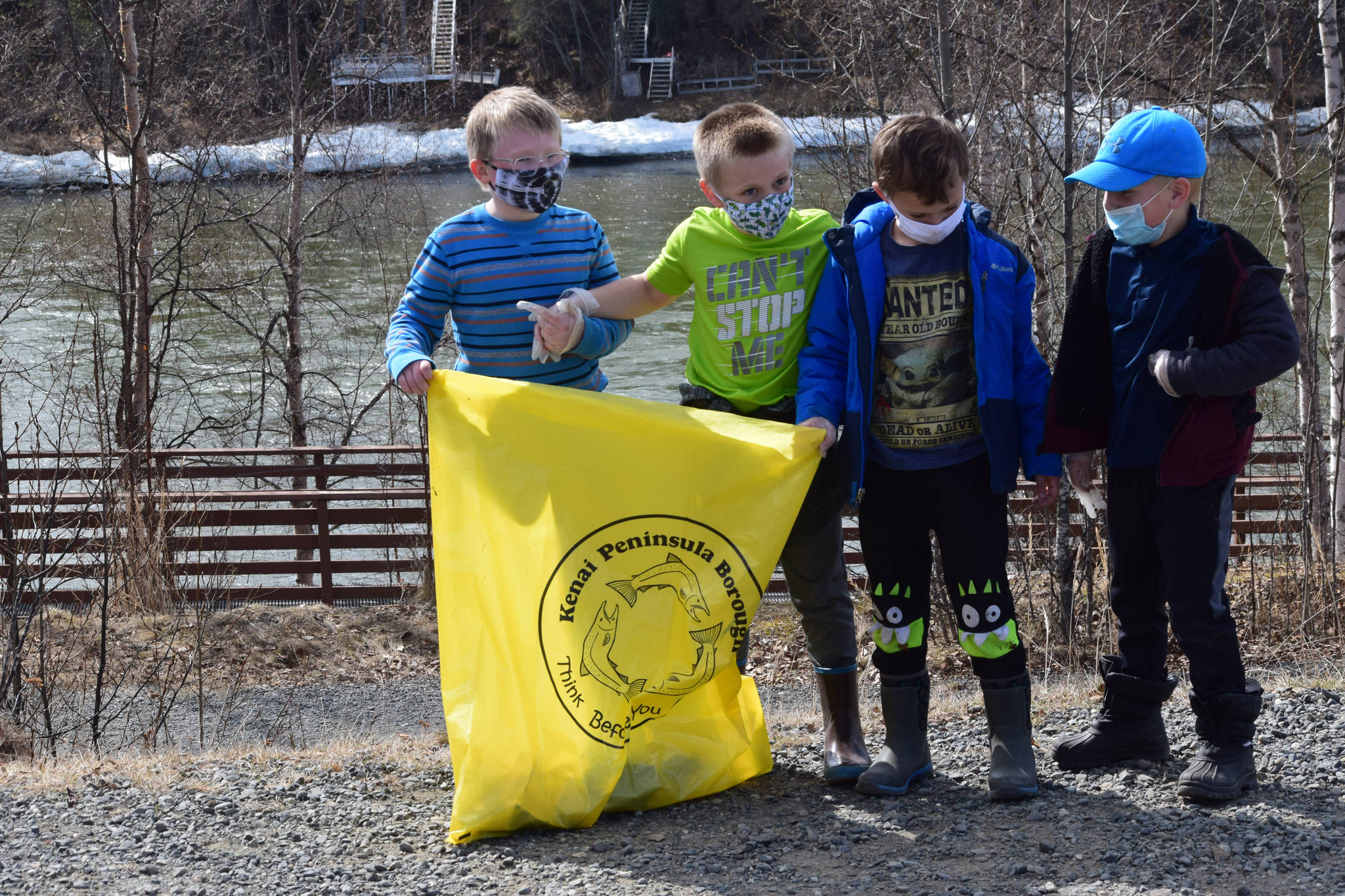 From left to right: Soldotna Montessori elementary schoolers Augie Mohr, Nathan Nelson, Kian Jester and Corbin Sulley participate in the annual Kenai River Spring Cleanup at Soldotna Creek Park in Soldotna, Alaska, on Friday, May 7, 2021. (Camille Botello / Peninsula Clarion)
From left to right: Soldotna Montessori elementary schoolers Augie Mohr, Nathan Nelson, Kian Jester and Corbin Sulley participate in the annual Kenai River Spring Cleanup at Soldotna Creek Park in Soldotna, Alaska, on Friday, May 7, 2021. (Camille Botello / Peninsula Clarion)