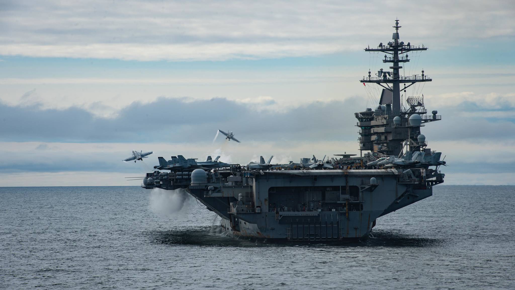 Two F/A-18 Super Hornets assigned to Carrier Air Wing (CVW) 11 launch from the flight deck of the aircraft carrier USS Theodore Roosevelt (CVN 71), April 29, 2021. (U.S. Navy / Mass Communication Specialist 3rd Class Erik Melgar)