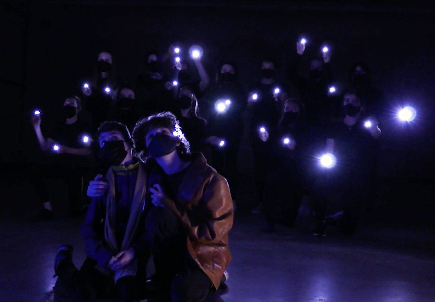 Foreground, from left to right: Kenai Middle School seventh grader Cooper Tallent-Darling and eighth grader Gavin Hunt act as their “Lion King” characters, Simba and Mufasa, while the rest of the cast acts in the background. The school drama department recorded and filmed a rendition of the Disney movie and premiered it in May 2021. (Photo provided by Kenai Middle School drama)