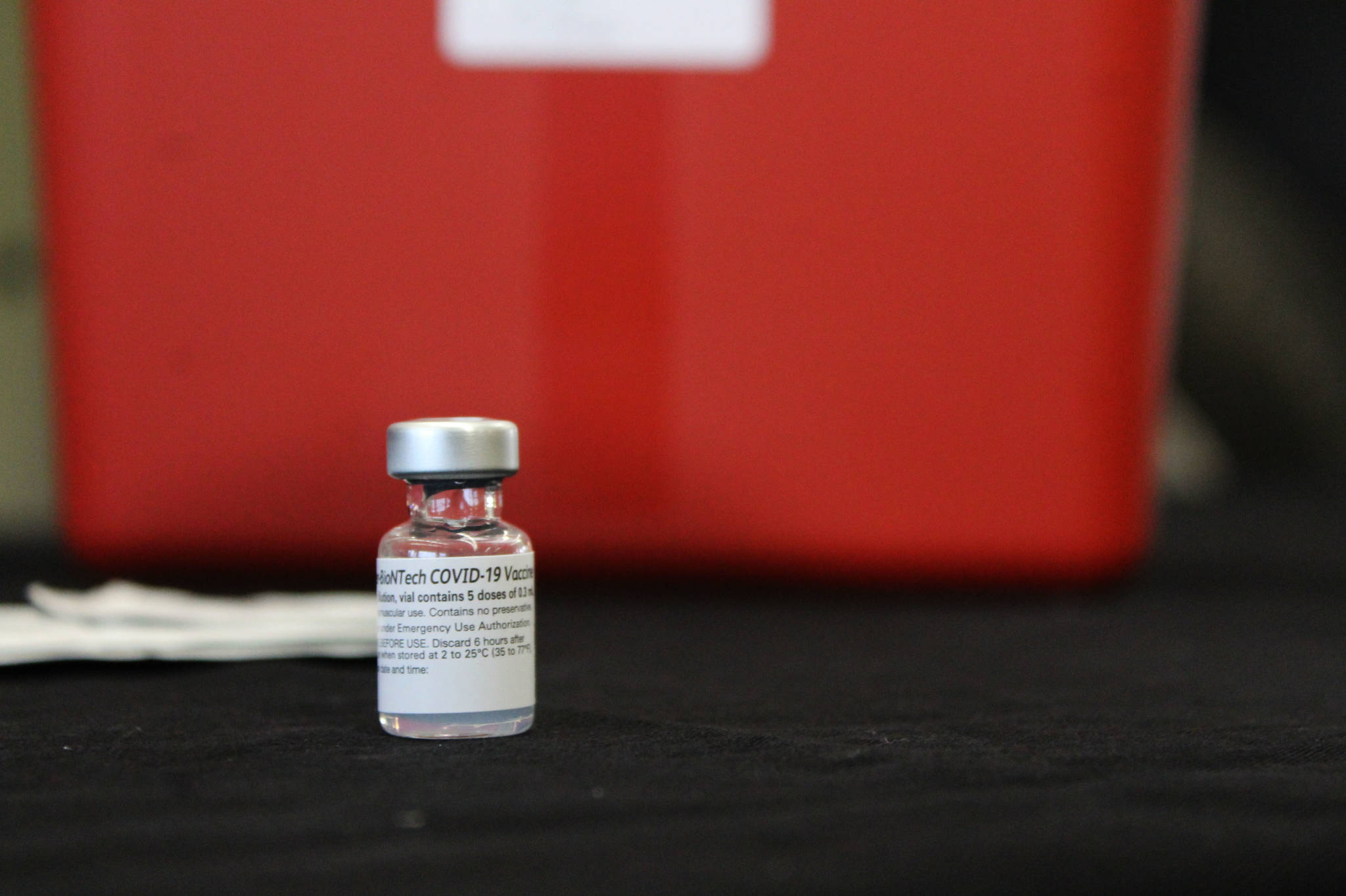 A vial of Pfizer’s COVID-19 vaccine is seen at Central Emergency Services Station 1 on Friday, Dec. 18, 2020, in Soldotna, Alaska. (Ashlyn O’Hara/Peninsula Clarion)