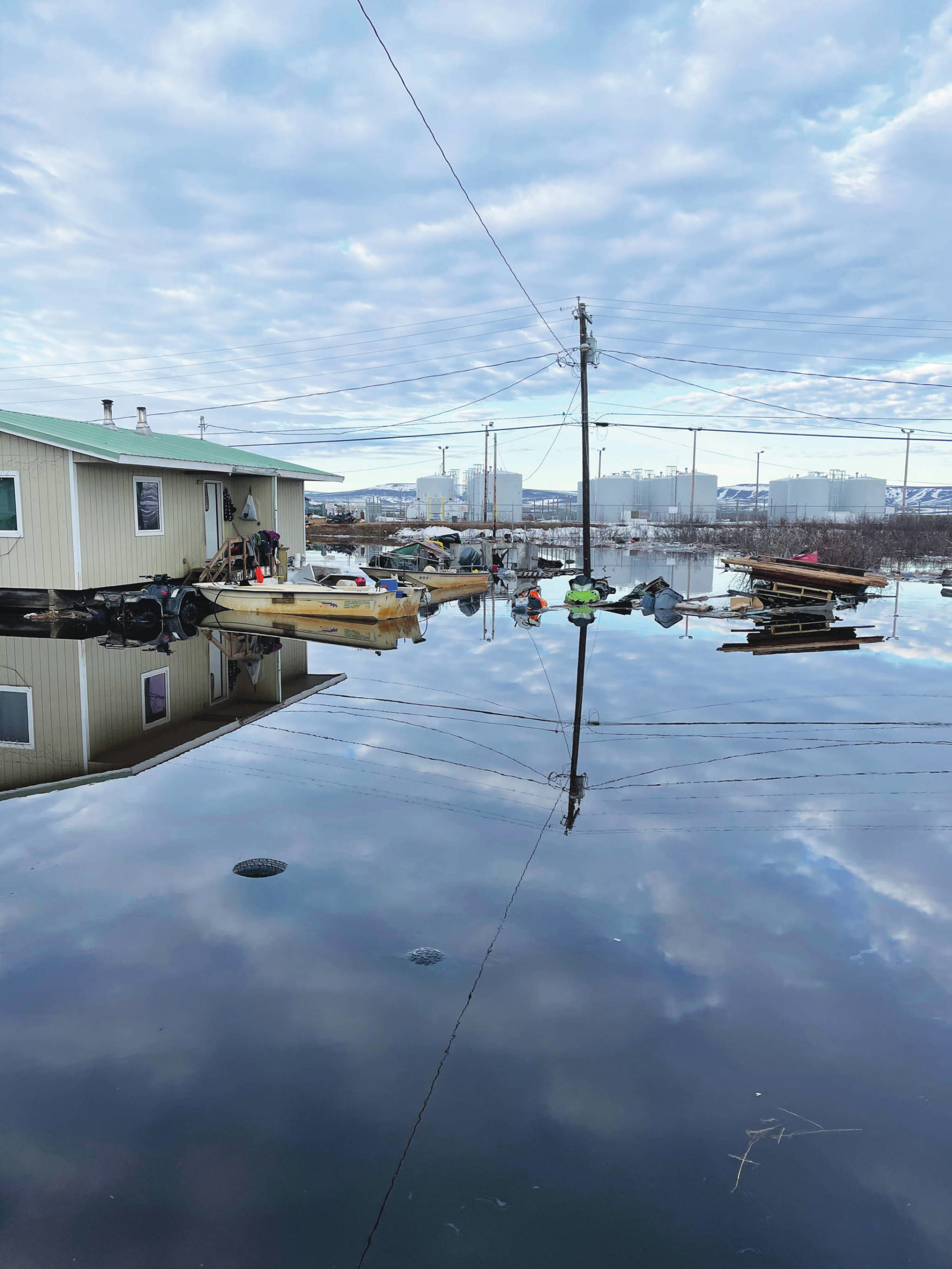 This photo provided by Nathan Hadley Jr. shows flooding in the village of Buckland, Alaska, on Thursday, May 13, 2021. An ice jam on the Buckland River, a half mile below the community, has caused the entire village of about 500 residents in northwest Alaska to be completely inundated. (Nathan Hadley Jr. via AP)