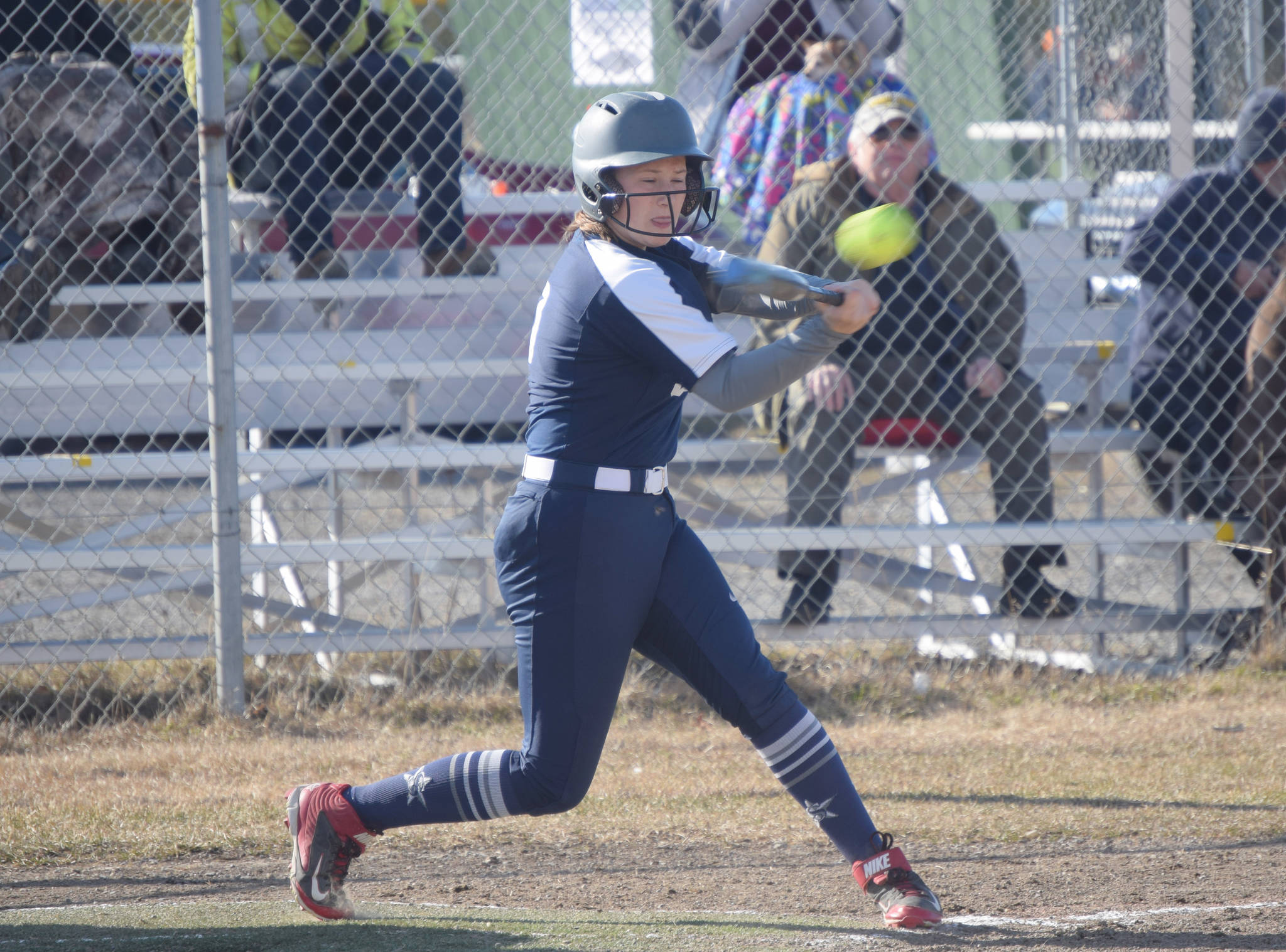 Soldotna’s Brook Fischer collects a hit against Kenai Central on Thursday, May 13, 2021, in Kenai, Alaska. (Photo by Jeff Helminiak/Peninsula Clarion)