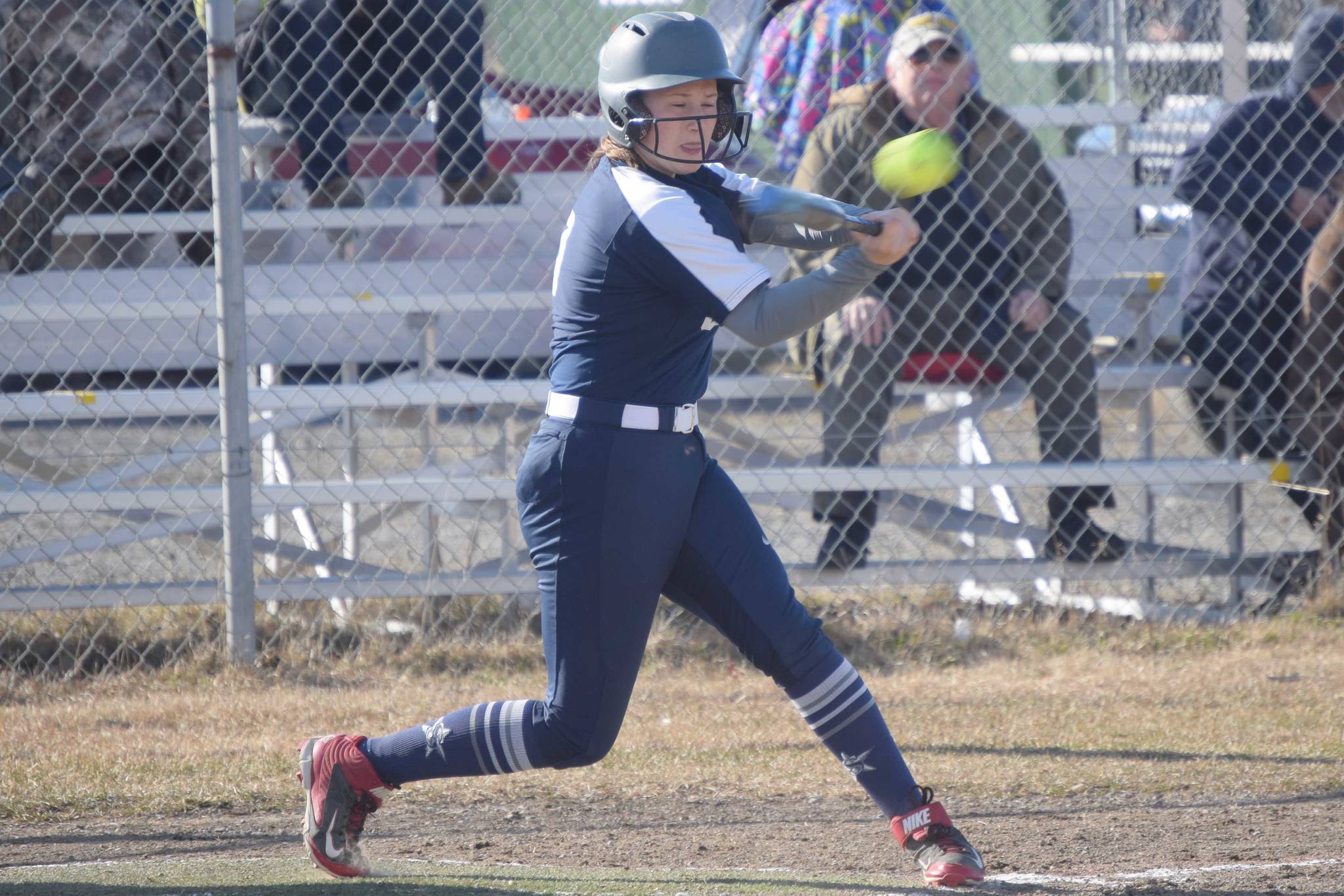 Soldotna's Brook Fischer collects a hit against Kenai Central on Thursday, May 13, 2021, in Kenai, Alaska. (Photo by Jeff Helminiak/Peninsula Clarion)