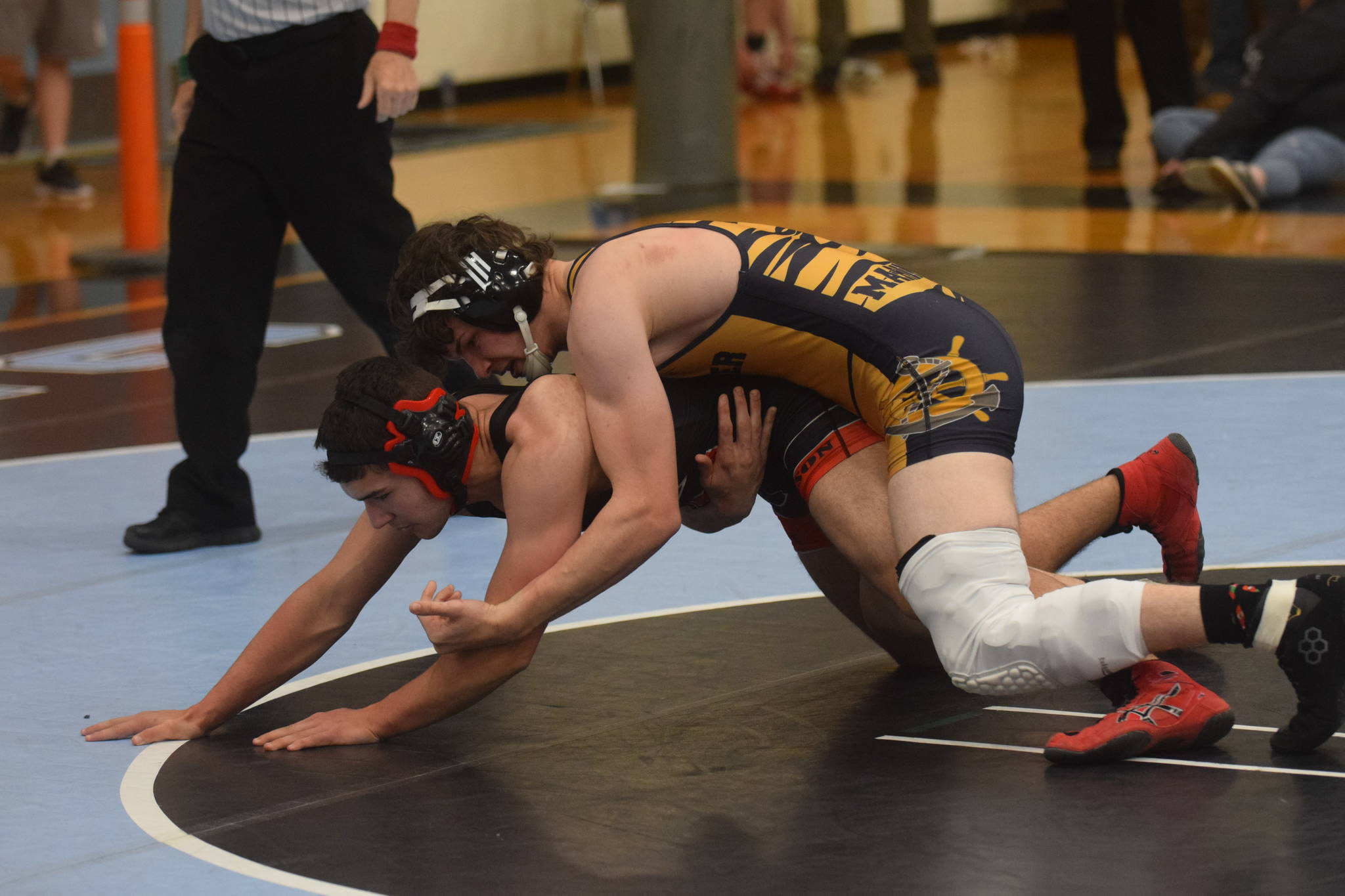 Homer High School senior Josh Bradshaw wrestles in the state championship in Chugiak, Alaska on Saturday, May 22, 2021. (Camille Botello / Peninsula Clarion)