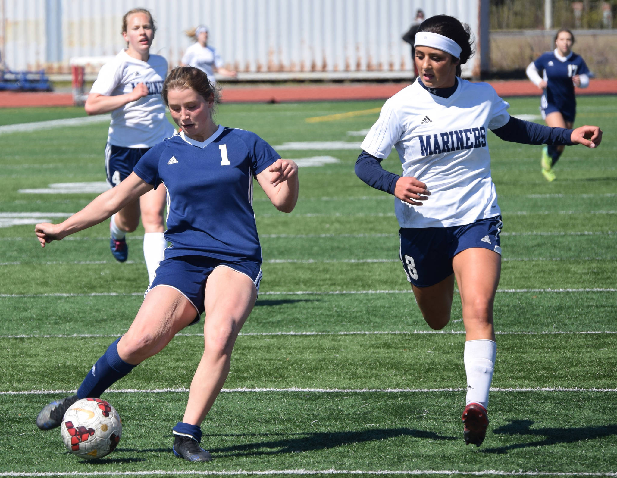 Soldotna’s Rhys Cannava shoots on Homer’s Debbie Weisser on Saturday, May 22, 2021, in the Peninsula Conference final at Kenai Central High School in Kenai, Alaska. (Photo by Jeff Helminiak/Peninsula Clarion)