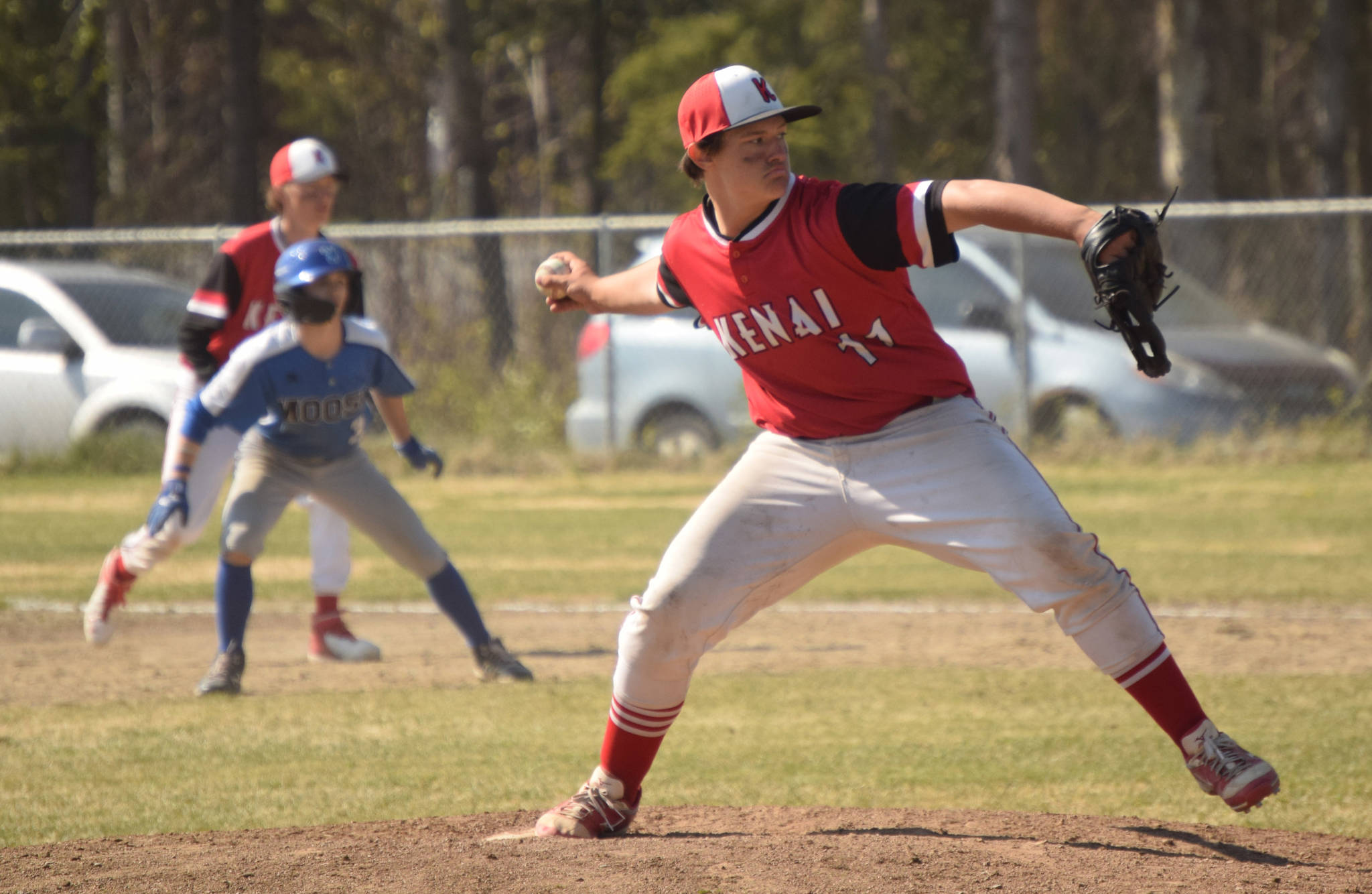 Kenai pitcher Gabe Smith delivers to Palmer on Thursday, May 27, 2021, at the Southcentral Conference tournament at the Soldotna Little League fields in Soldotna, Alaska. (Photo by Jeff Helminiak/Peninsula Clarion)