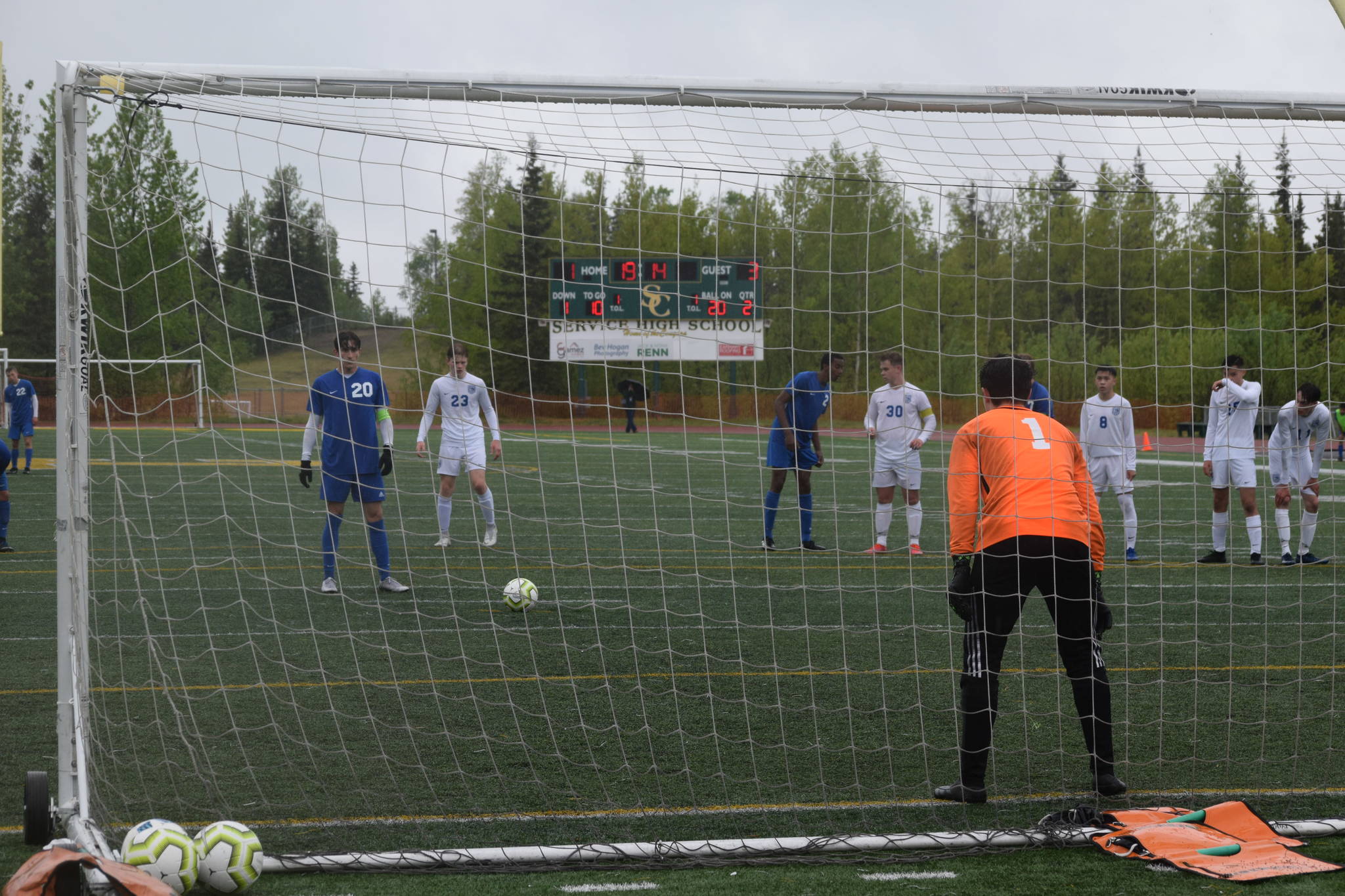 Josh Hieber lines up a penalty kick during the state championship game in Anchorage, Alaska on Saturday, May 29, 2021. (Camille Botello / Peninsula Clarion)