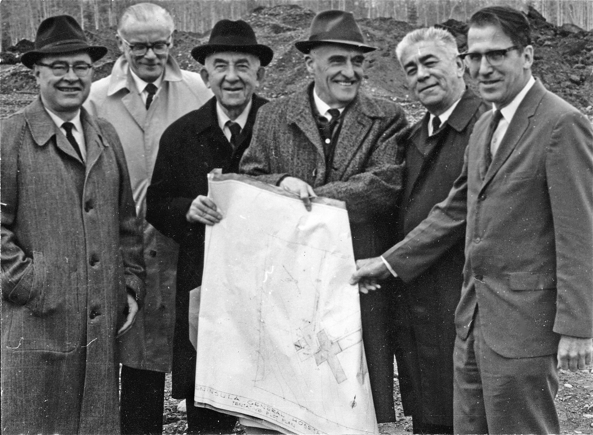 Cheechako News file photo from KPCs Kenai Peninsula Historical Photo Repository
Politicians lined up at the March 1966 groundbreaking for the new hospital. Pictured (L-R) are George Sundborg, administrative assistant to U.S. Sen. Ernest Gruening; Alaska gubernatorial candidate Wendell Kay; Sen. Gruening holding the construction plans with U.S. Rep. Ralph Rivers; Elmer Gagnon, Alaska director of the Federal Housing Administration; and Per Osmar, the hospital campaign fund manager.