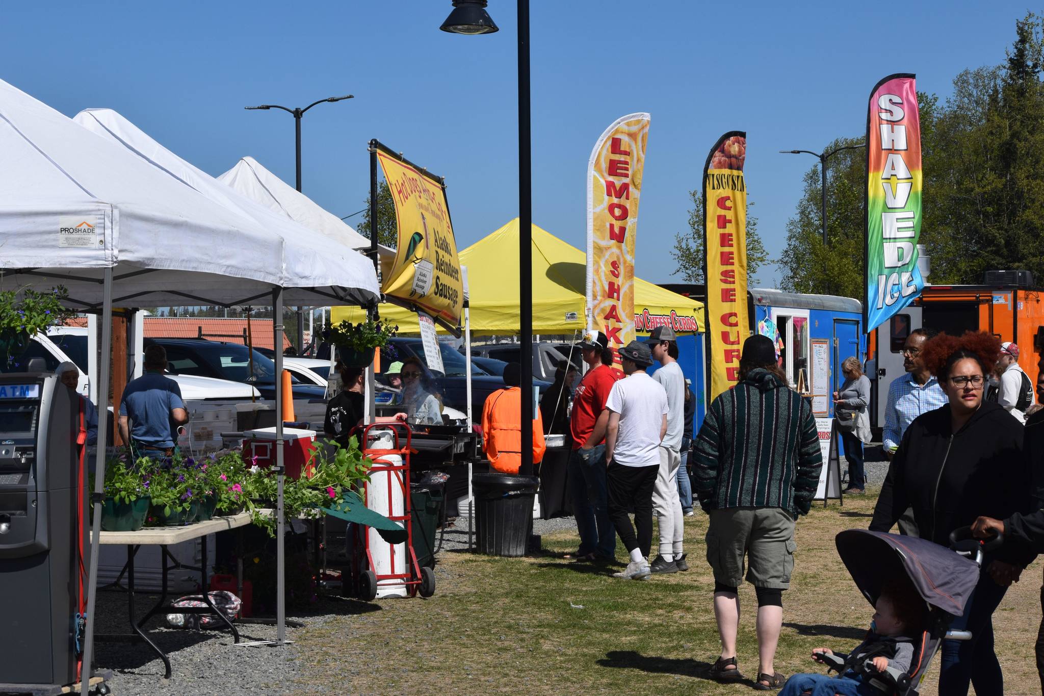 The community attends the first Wednesday Market at Soldotna Creek Park on May 26, 2021. (Camille Botello / Peninsula Clarion)