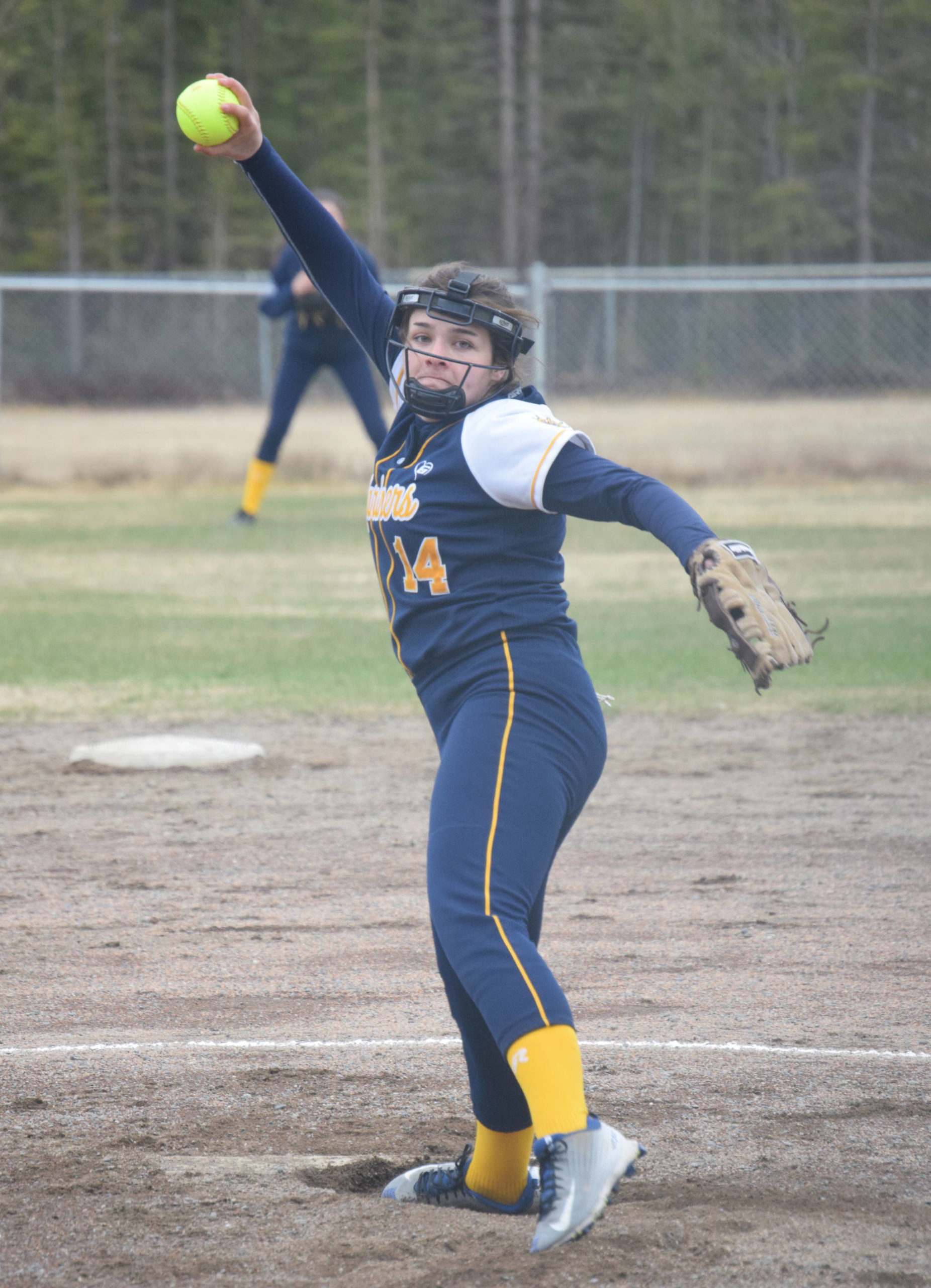 Homer pitcher Zoe Adkins delivers to Soldotna on Thursday, May 20, 2021, in Soldotna, Alaska. (Photo by Jeff Helminiak/Peninsula Clarion)