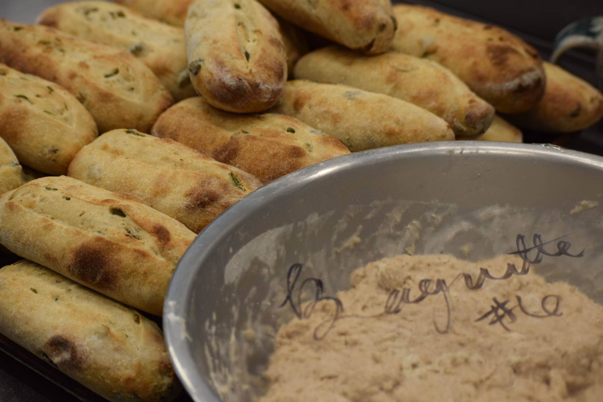 Freshly baked loaves are ready for resale at Lucy’s Market in Soldotna, Alaska, on Wednesday, May 26, 2021. (Camille Botello/Peninsula Clarion)