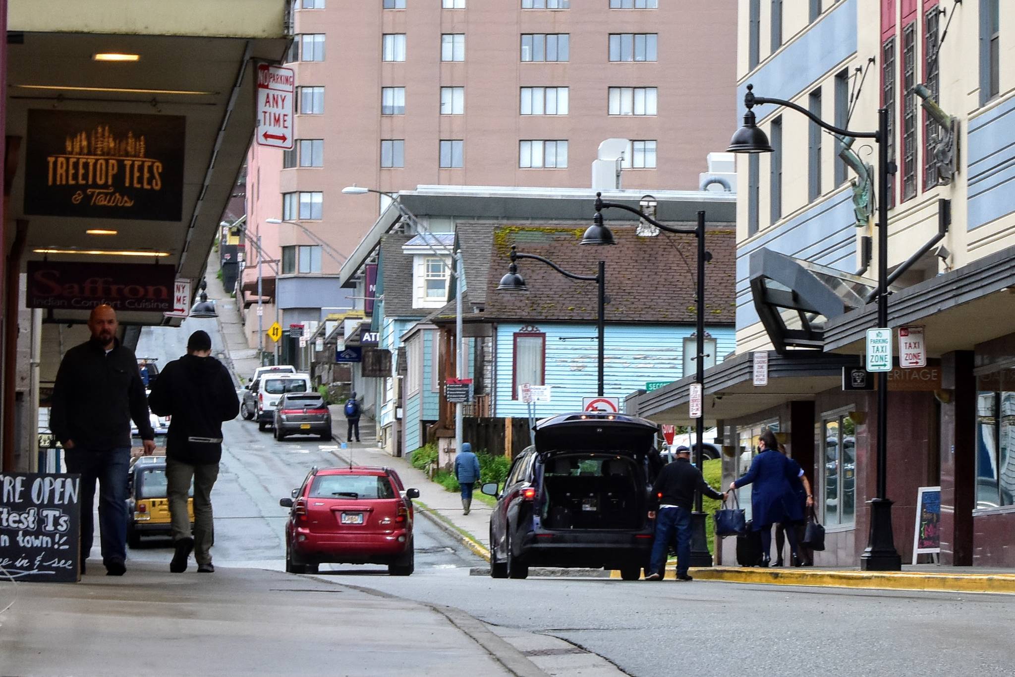 Peter Segall / Juneau Empire
Visitors depart from the Baranoff Hotel in downtown Juneau on Thursday, June 3, 2021, just days after the typically year-round hotel reopened its doors after closing for the COVID-19 pandemic. Travelers are returning, hoteliers say, but many of their rooms remain empty.