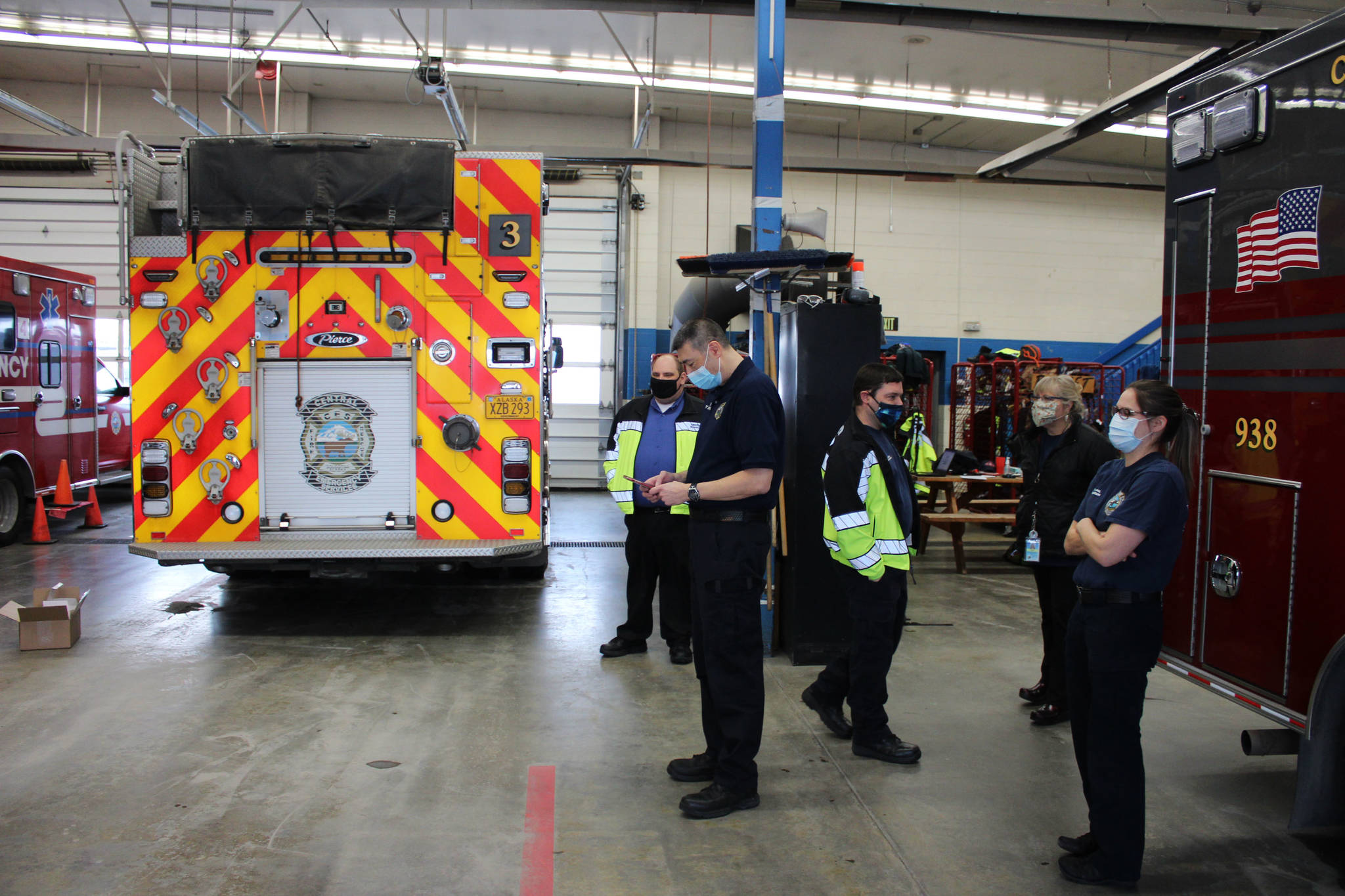 Central Emergency Services staff wait to receive doses of Pfizer’s COVID-19 vaccine on Dec. 18, 2020 in Soldotna, Alaska. (Ashlyn O’Hara/Peninsula Clarion)