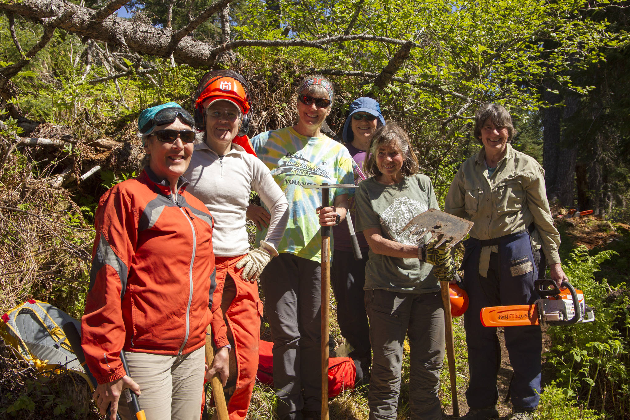 A group of six women tackled the work needing to be done during National Trails Day at South Eldred trail including cutting up fallen trees, re-establishing the trail tread, clearing overgrown plants and ensuring the trail markings were in sight and up-to-date. Pictured left to right are Kristine Moerlien, Amy Holman, Kathy Sarns, Lyn Maslow, Ruth Dickerson and Kris Holderied. (Photo by Sarah Knapp/Homer News)