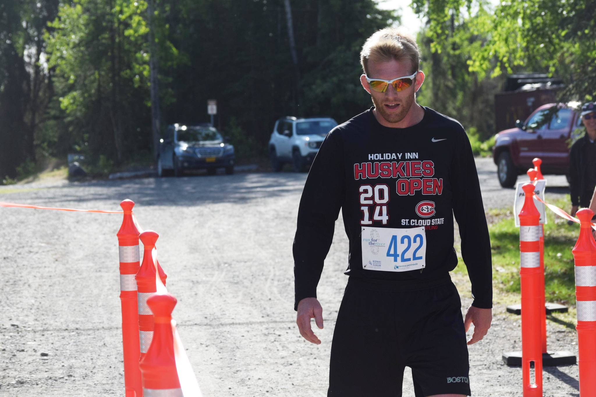 Ben McPhail finishes second in the men’s 5K race at the Kenai Watershed Forum’s Run for the River in Soldotna Creek Park on Saturday, June 12, 2021. (Camille Botello/Peninsula Clarion)