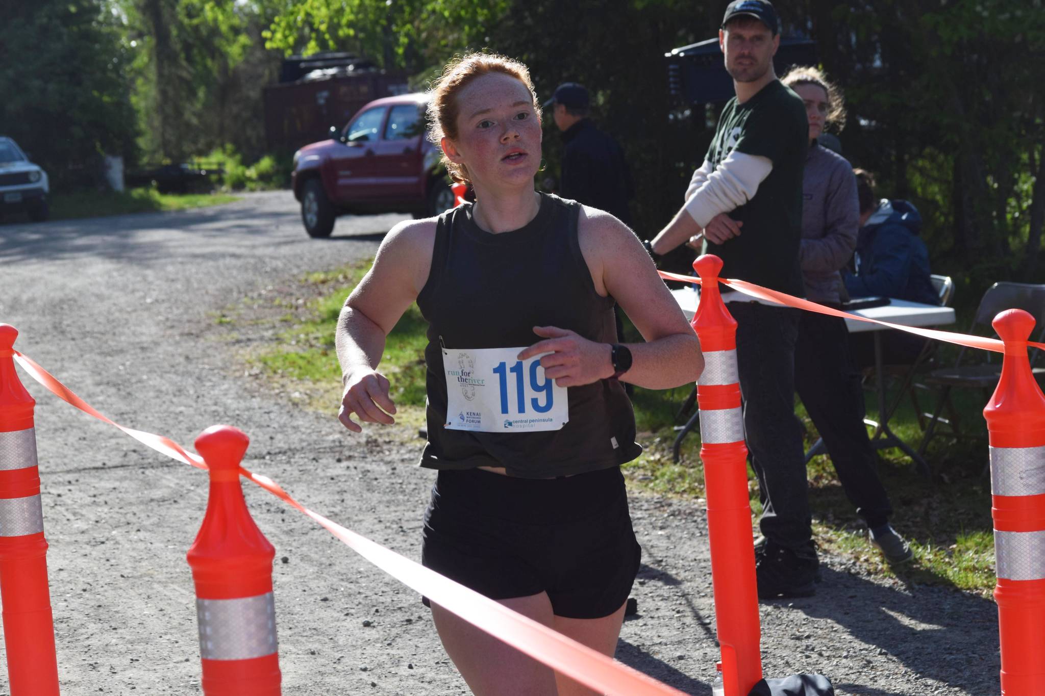 Aubrey Curl finishes first in the women’s 5K race at the Kenai Watershed Forum’s Run for the River in Soldotna Creek Park on Saturday, June 12, 2021. (Camille Botello/Peninsula Clarion)