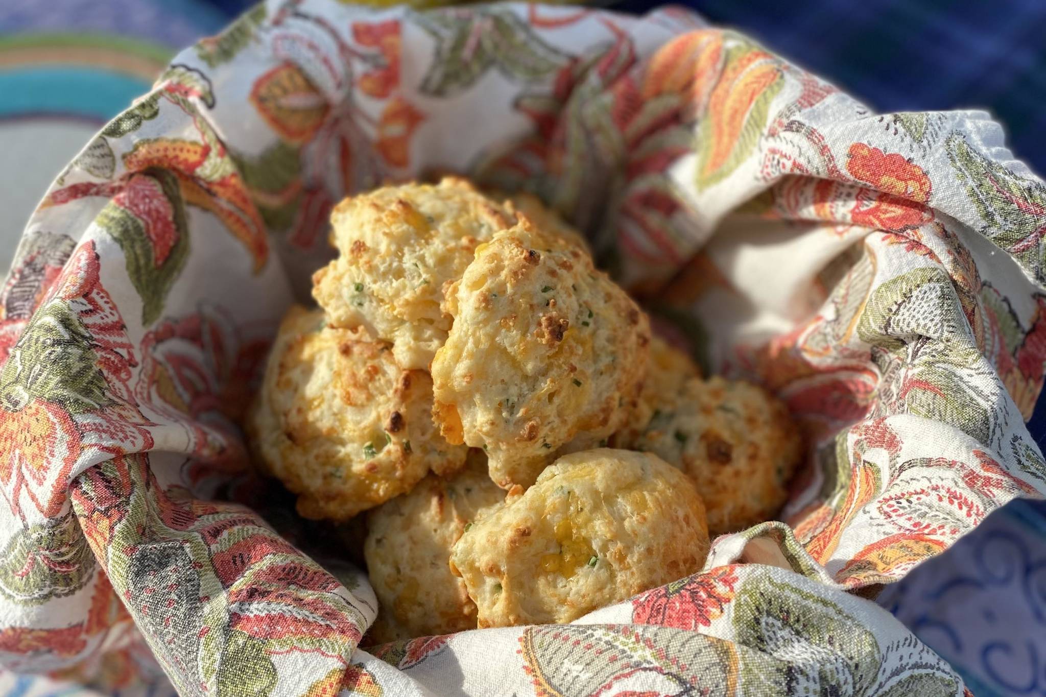 Cheddar biscuits go hand in hand with summer seafood catch. Photographed on Saturday, June 12, 2021, in Nikiski, Alaska. (Photo by Tressa Dale)