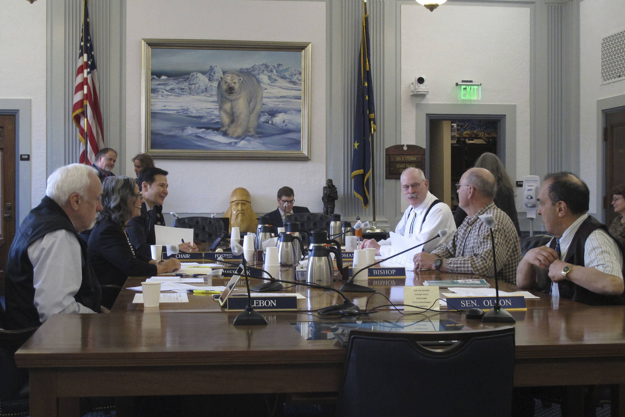Alaska House and Senate members who make up a budget conference committee are shown before starting a meeting in Juneau, Alaska, on Sunday, June 13, 2021. (AP Photo/Becky Bohrer)
