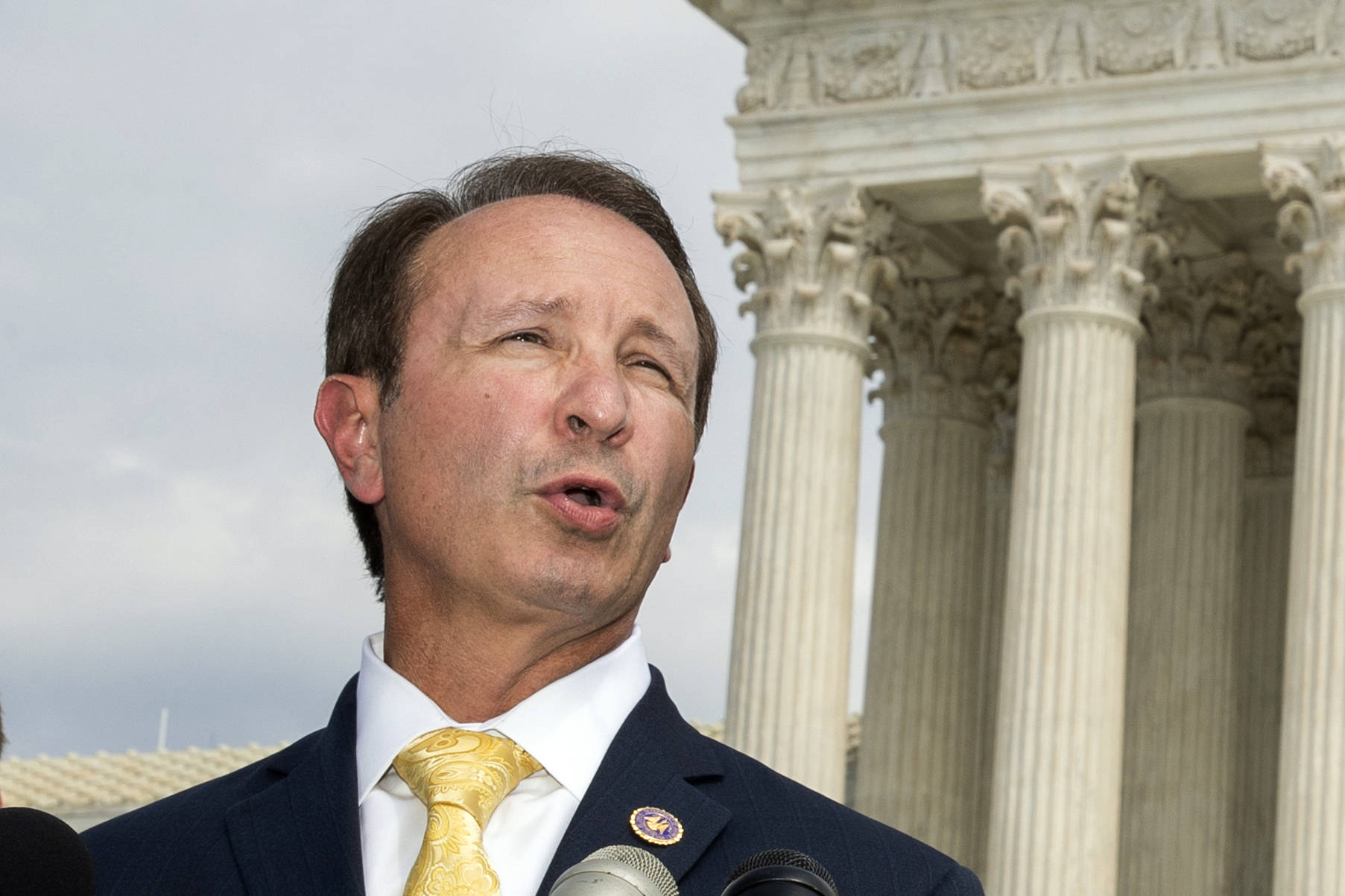 In this Sept. 9, 2019, file photo, Louisiana Attorney General Jeff Landry speaks in front of the U.S. Supreme Court in Washington. The Biden administration’s suspension of new oil and gas leases on federal land and water was blocked Tuesday, June 15, 2021, by a federal judge in Louisiana. U.S. District Judge Terry Doughty’s ruling came in a lawsuit filed in March by Louisiana’s Republican attorney general, Jeff Landry and officials in 12 other states. Doughty’s ruling granting a preliminary injunction to those states said his order applies nationwide. (AP Photo/Manuel Balce Ceneta, File)