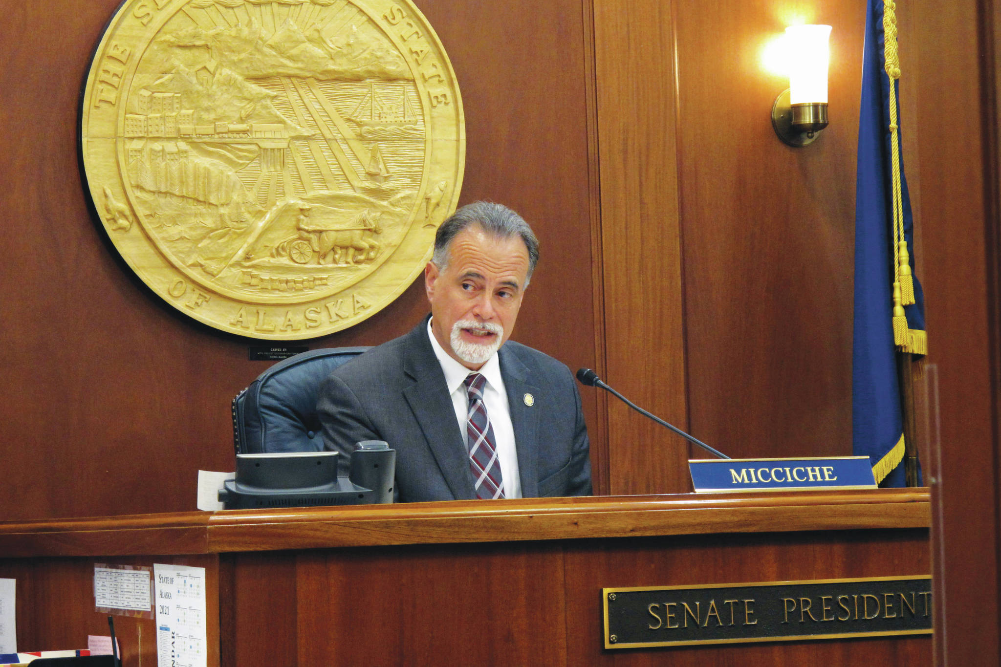 Alaska Senate President Peter Micciche prepares for the start of a brief Senate floor session on Tuesday, June 15, 2021, in Juneau, Alaska. Lawmakers were trying to reach resolution on a state spending package during the special legislative session. (AP Photo/Becky Bohrer)