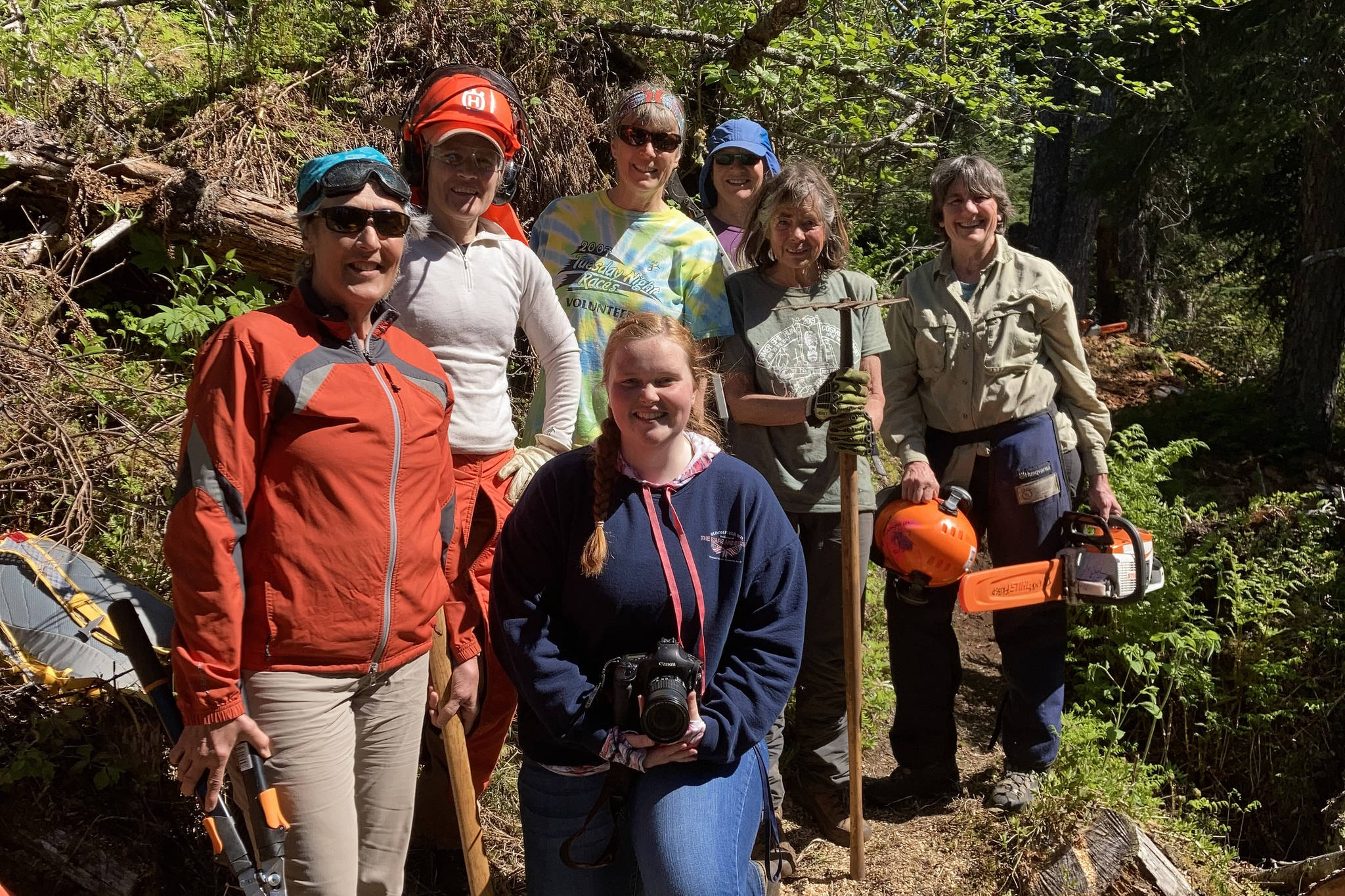 Homer News reporter Sarah Knapp (kneeling) is pictured with the Friends of Kachemak Bay State Park volunteer group who cleared South Eldred Trail during National Trails Day on June 5. The group was able to clear half a mile of the trail. Pictured left to right are Kristine Moerlein, Amy Holman, Kathy Sarns, Lyn Maslow, Ruth Dickerson and Kris Holderied. (Photo by Michael Singer)
