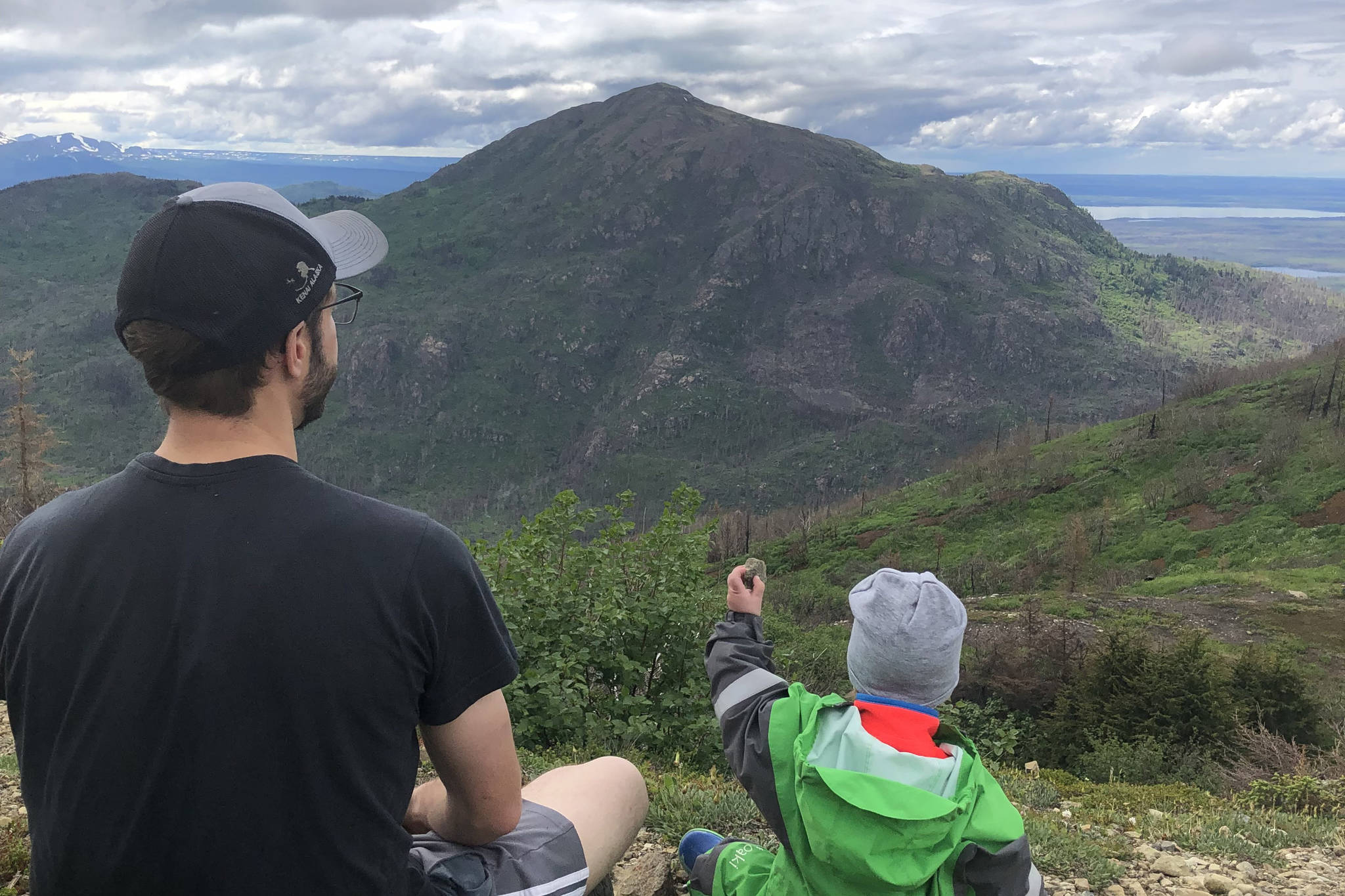 The author’s husband, Quinn Dale (left), and son, Hawkin, enjoy the view from Skyline trail on Saturday, in Cooper Landing. (Photo by Tressa Dale/Peninsula Clarion)