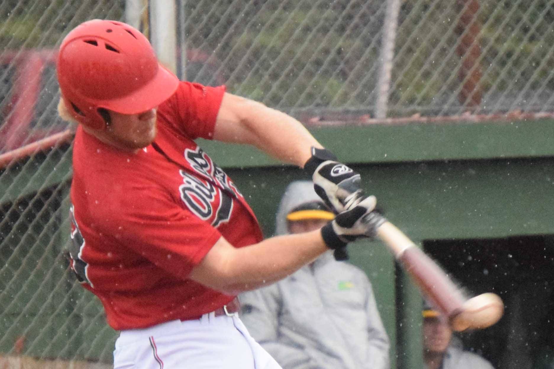 Garrett Pennington of the Peninsula Oilers singles against the Mat-Su Miners on Wednesday, June 23, 2021, at Coral Seymour Memorial Park in Kenai, Alaska. (Photo by Jeff Helminiak/Peninsula Clarion)