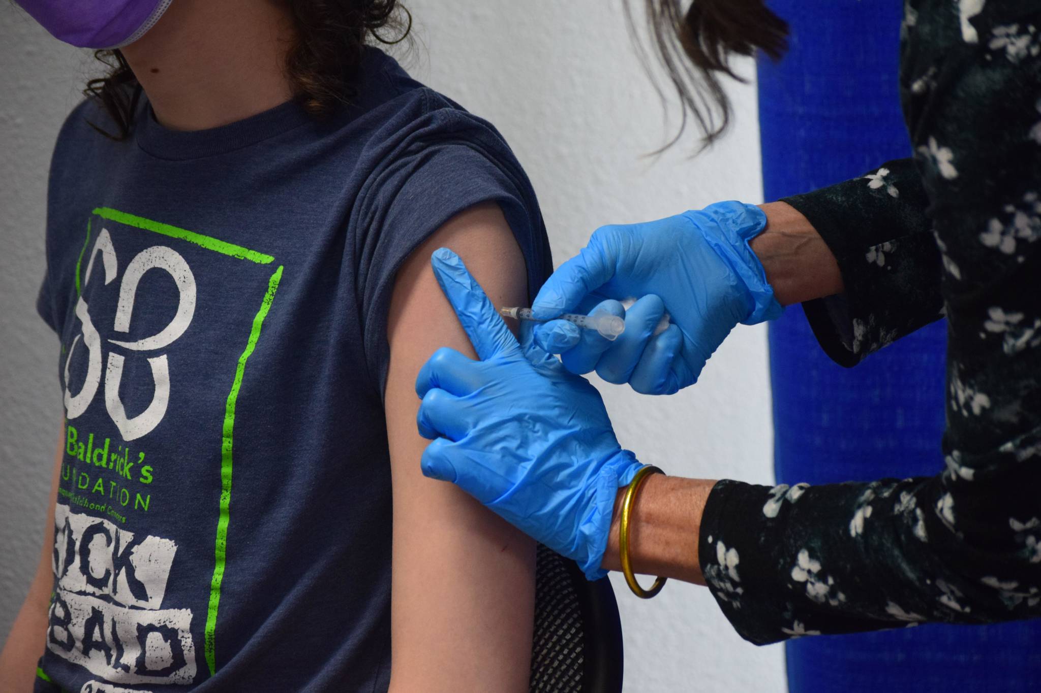 Gavin Hunt, 13, receives his second dose of the Pfizer-BioNTech vaccine at the walk-in clinic at the intersection of the Kenai Spur and Sterling Highways in Soldotna, Alaska on Wednesday, June 9, 2021. (Camille Botello / Peninsula Clarion)