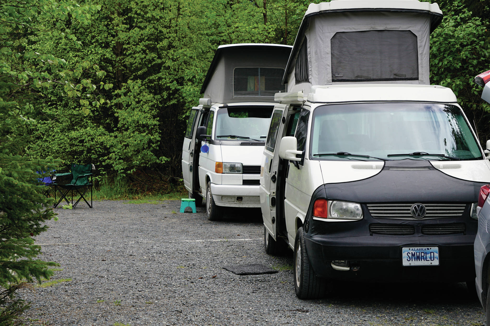 Two vintage VW campers are seen on Thursday, June 10, 2021, at the Trail River Campground near Seward, Alaska. (Photo by Michael Armstrong/Homer News)