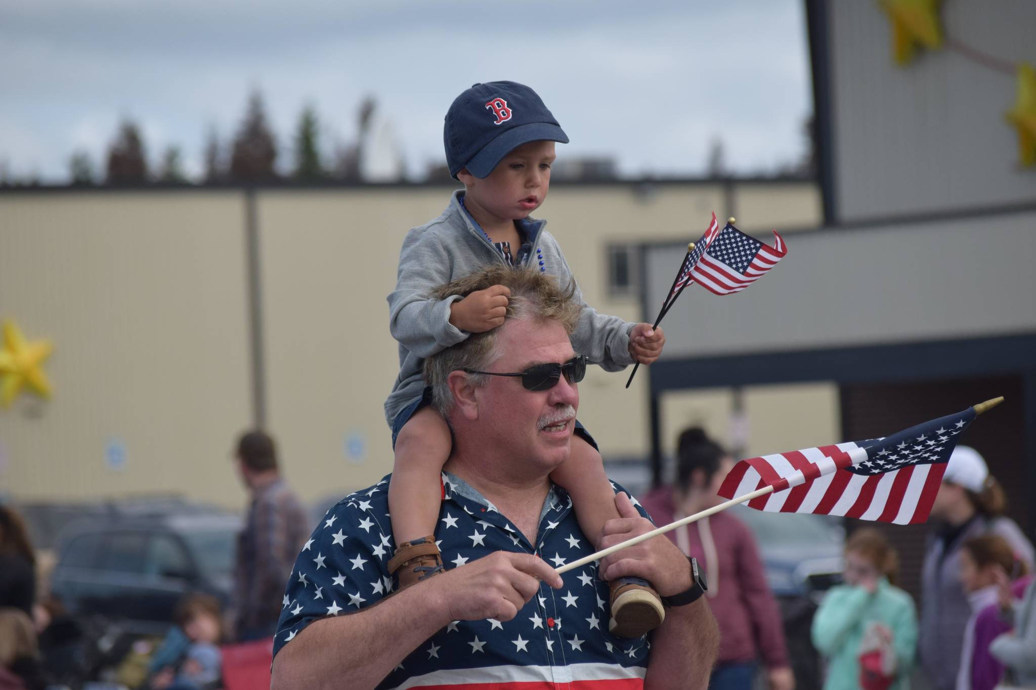 Community members affiliated with local organizations participate in Kenai’s annual Fourth of July parade on July 4, 2021. (Camille Botello / Peninsula Clarion)