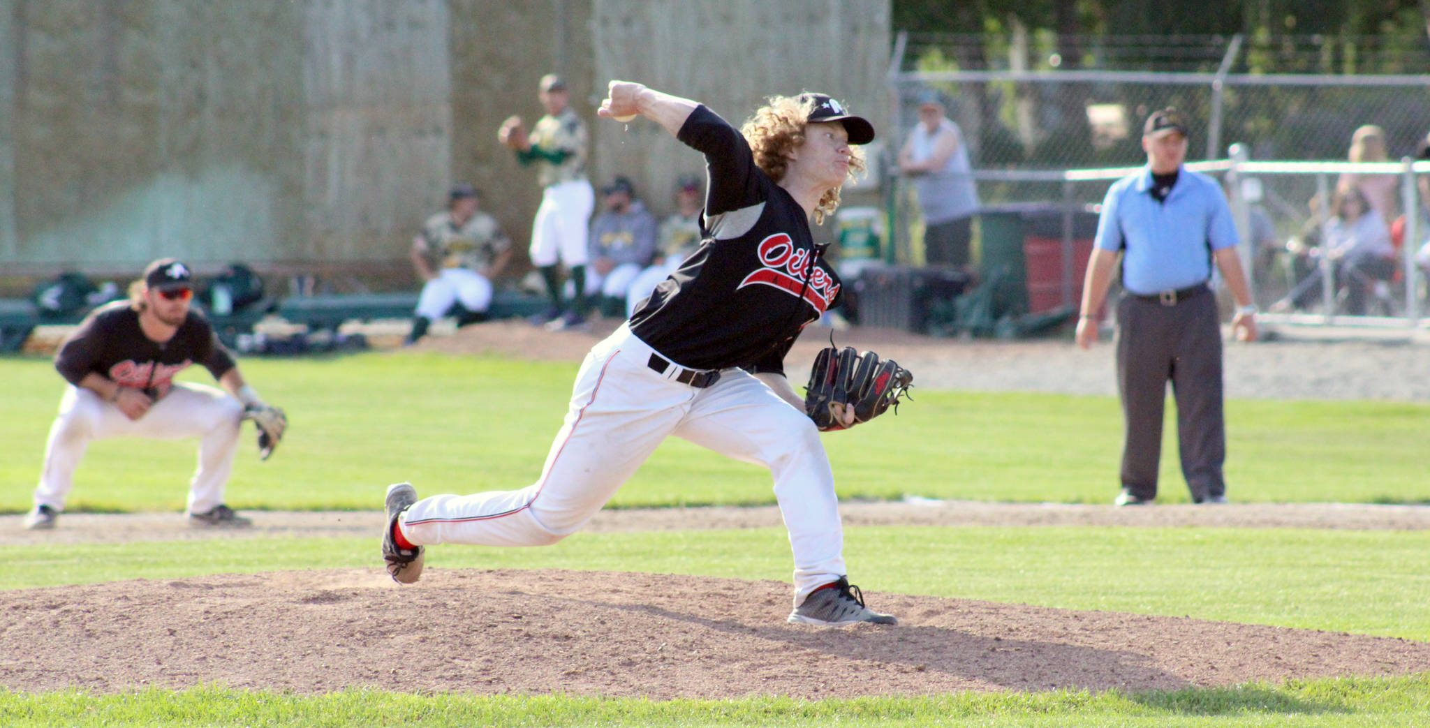 Mose Hayes of the Peninsula Oilers delivers to the Mat-Su Miners on Sunday, July 4, 2021, at Hermon Brothers Field in Palmer, Alaska. (Photo by Tim Rockey/Frontiersman)