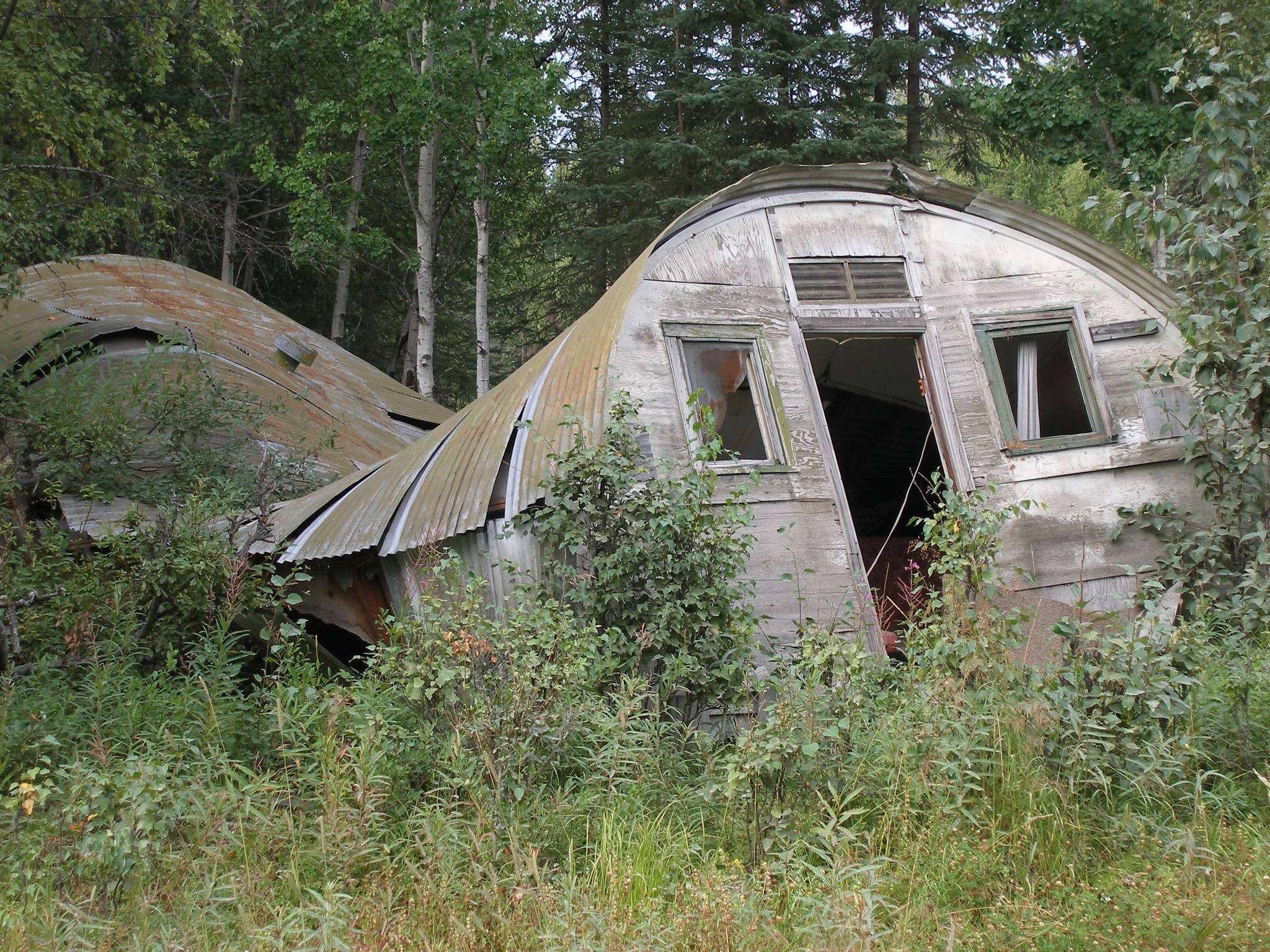 Sometimes called “Murder House” in the years after the killing, this dilapidated Quonset hut was the scene of the crime. (2007 photo by Clark Fair)