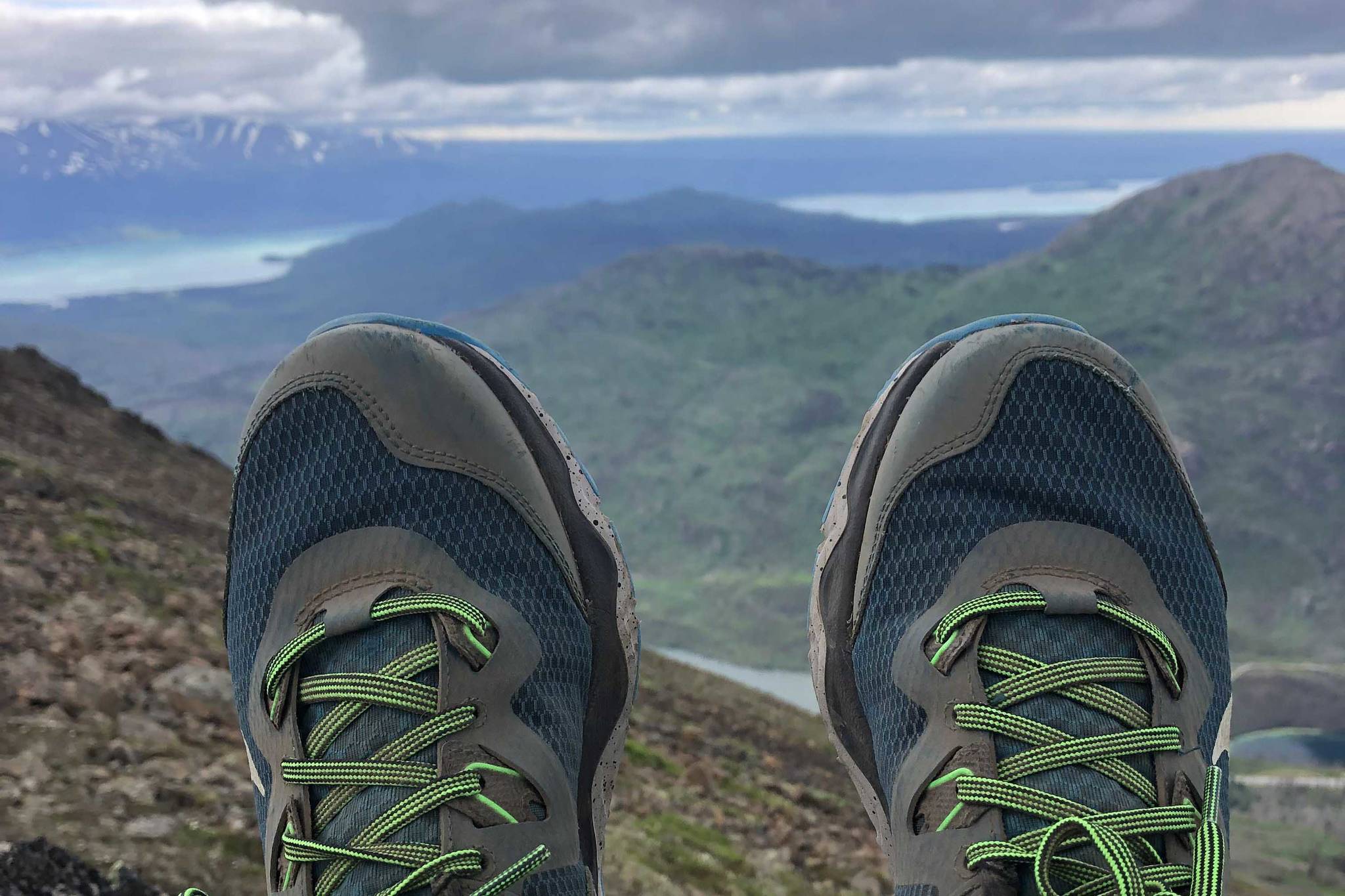 Camille Botello reaches the Skyline summit near Cooper Landing, Alaska with dirty ankles on June 27, 2021. (Camille Botello / Peninsula Clarion)